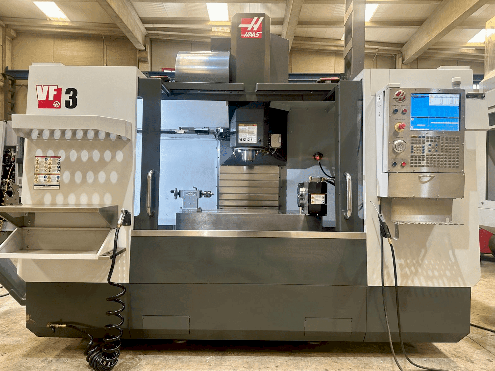 Front view of HAAS VF-3  machine
