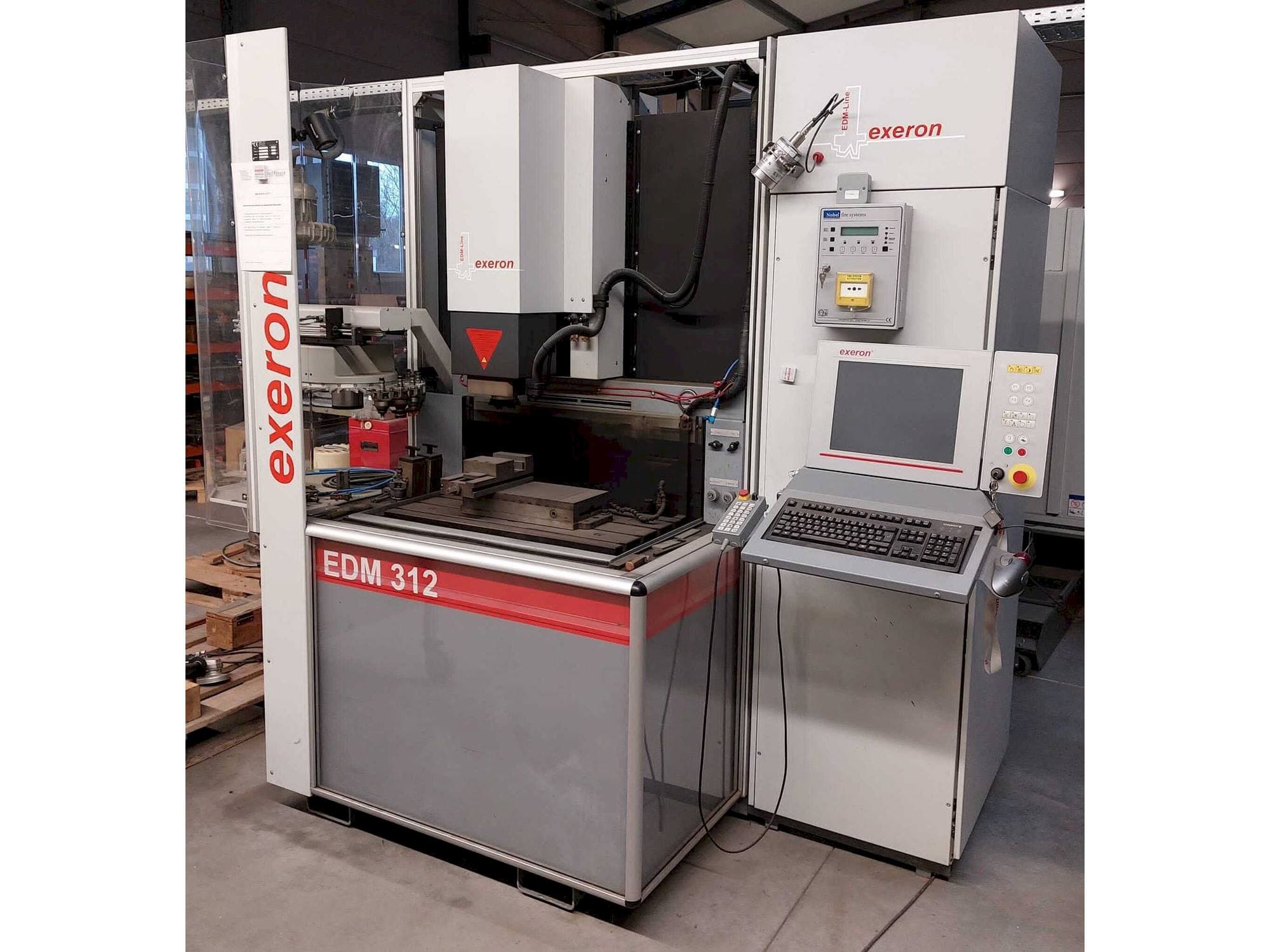 Front view of Exeron EDM 312 MF20 machine