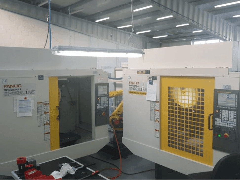 Front view of FANUC RoboDrills D21LiA5 + M20iA/M35  machine