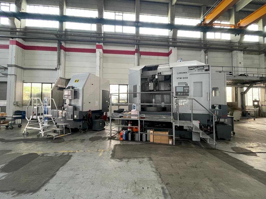Front view of Okuma VTM-200 1ST machine