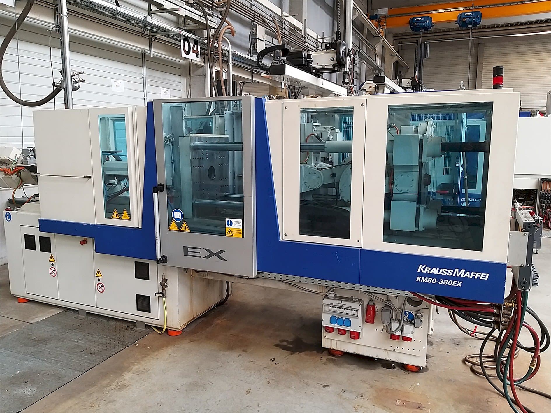 Front view of Krauss Maffei 80-380 Ex machine
