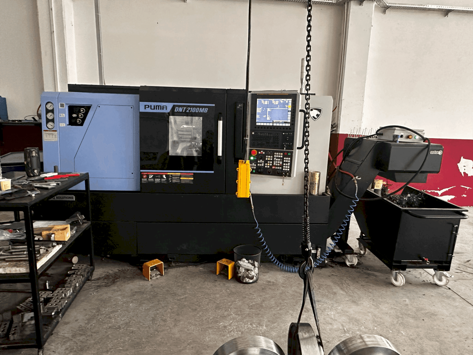 Front view of DN SOLUTIONS Puma DNT2100MB machine