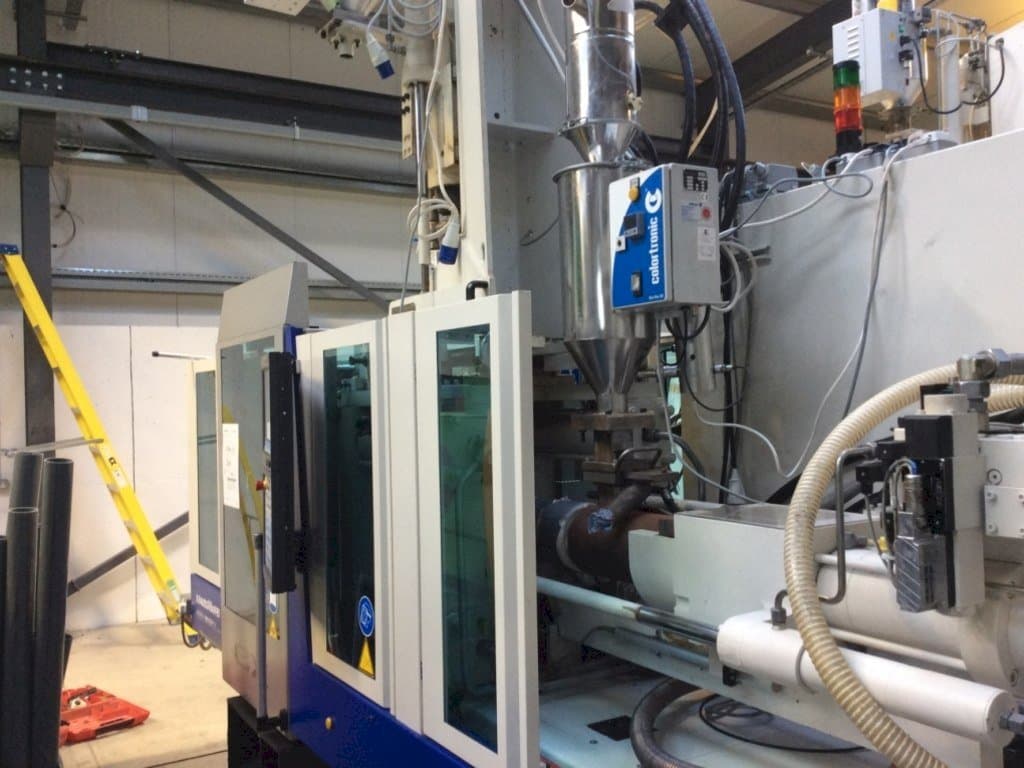 Front view of Krauss Maffei 80-180-55 CX V machine