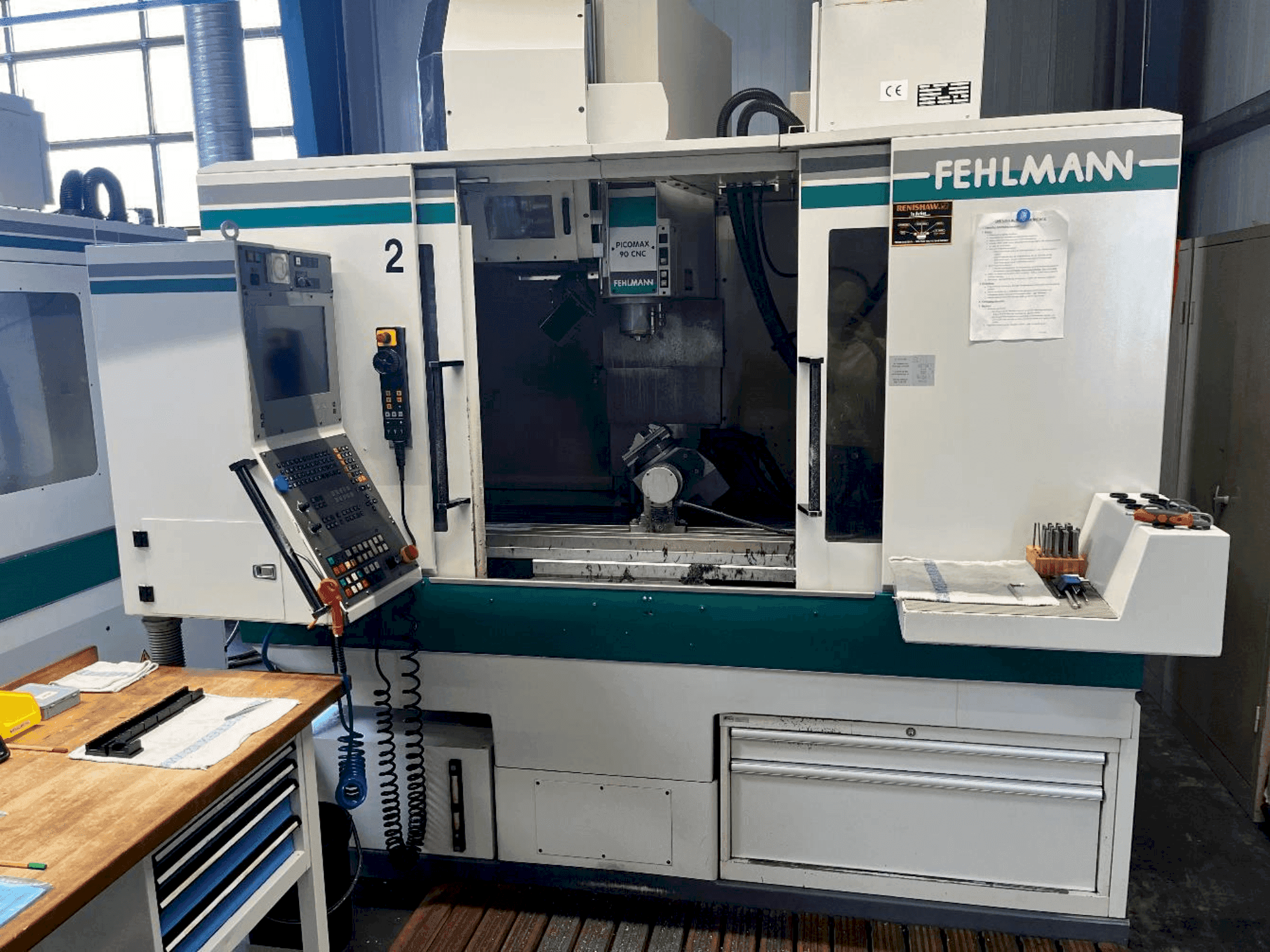 Front view of FEHLMANN Picomax 90 CNC  machine