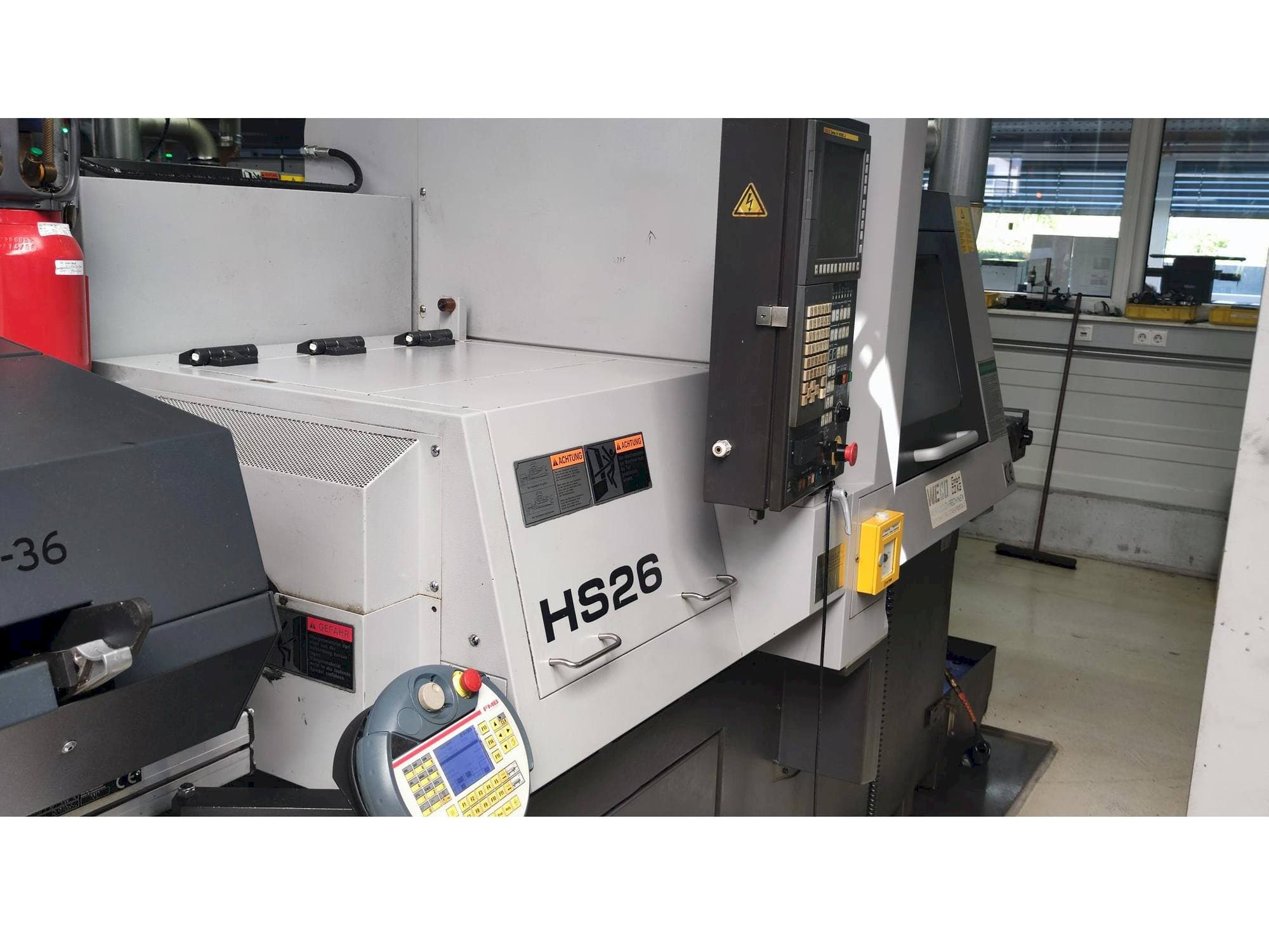 Left side view of TSUGAMI HS26 machine