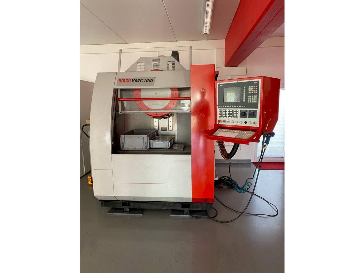 Front view of EMCO VMC 300 machine
