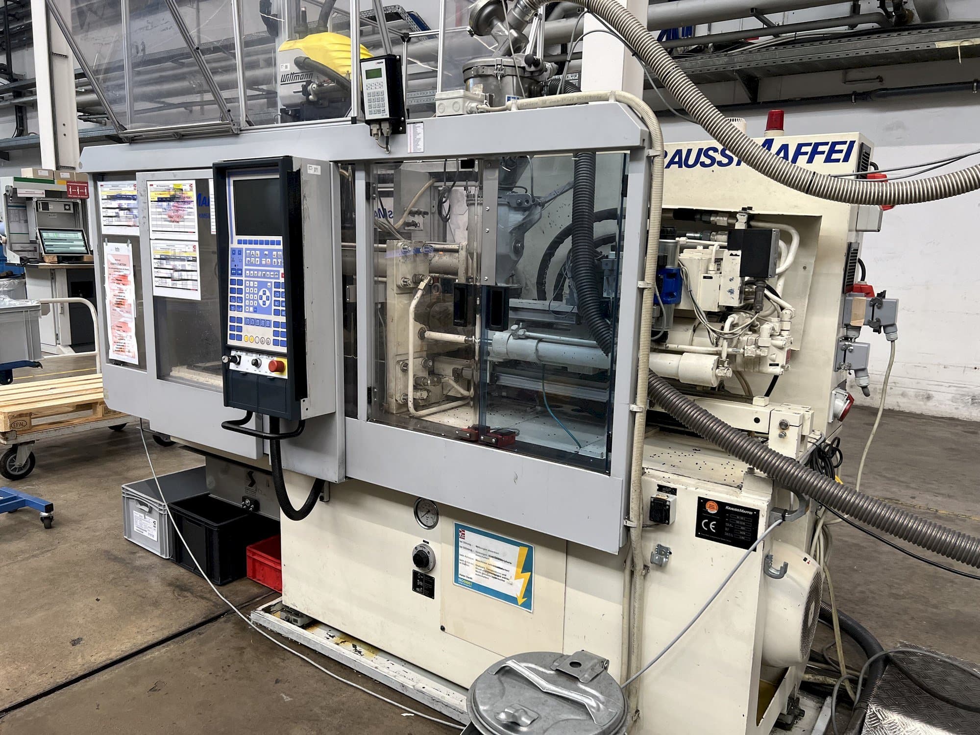 Front view of Krauss Maffei KM 50-125 C1 machine