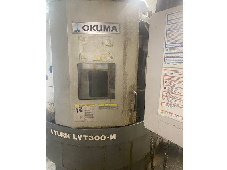 Front view of Okuma LVT300M machine