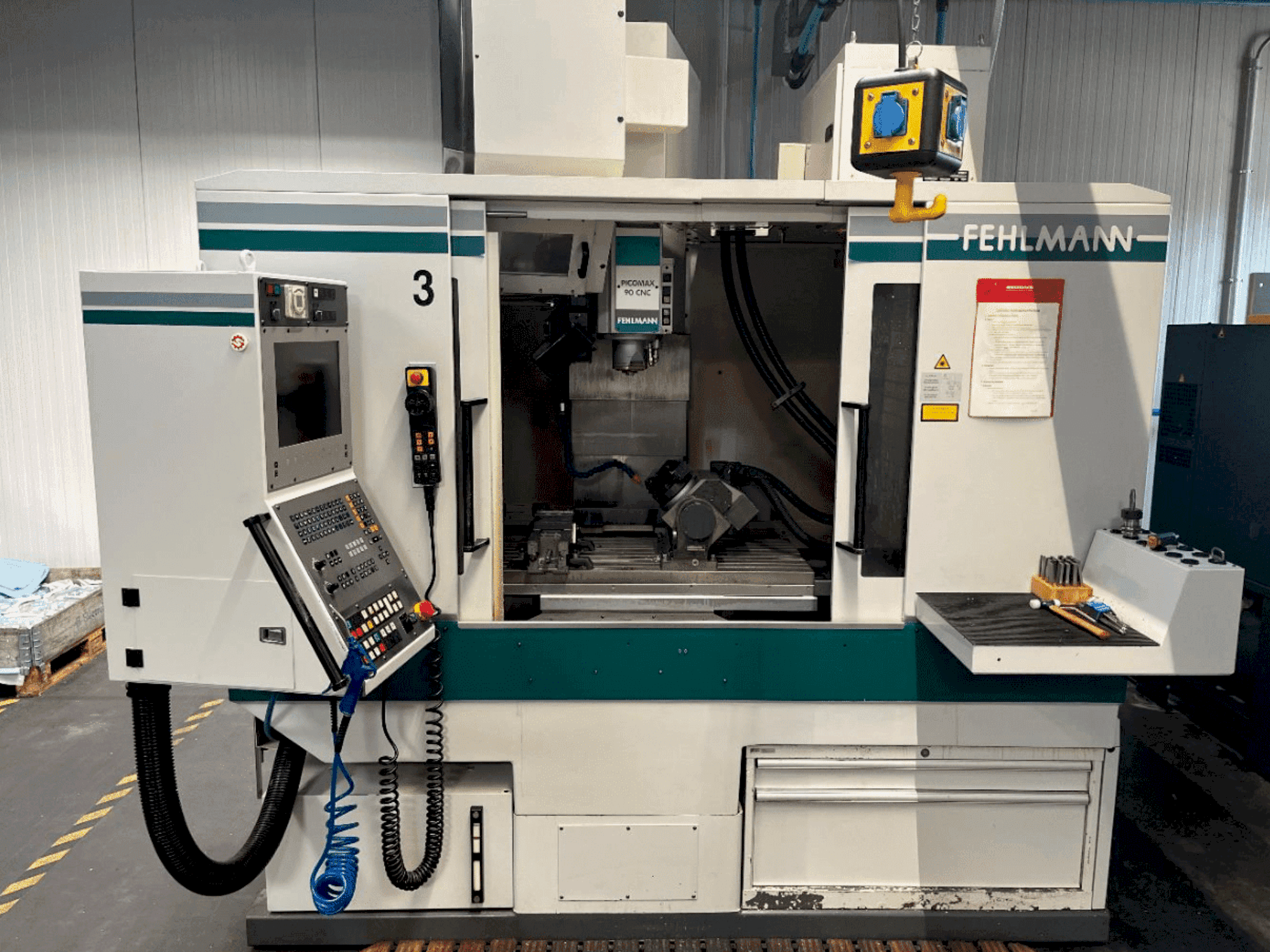Front view of FEHLMANN Picomax 90-M machine