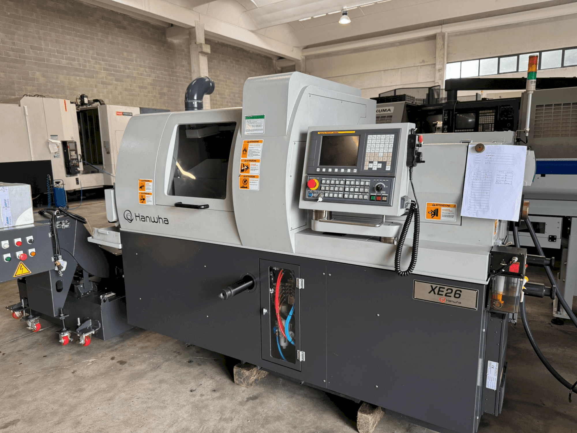 Front view of Hanwha XE 26 H machine