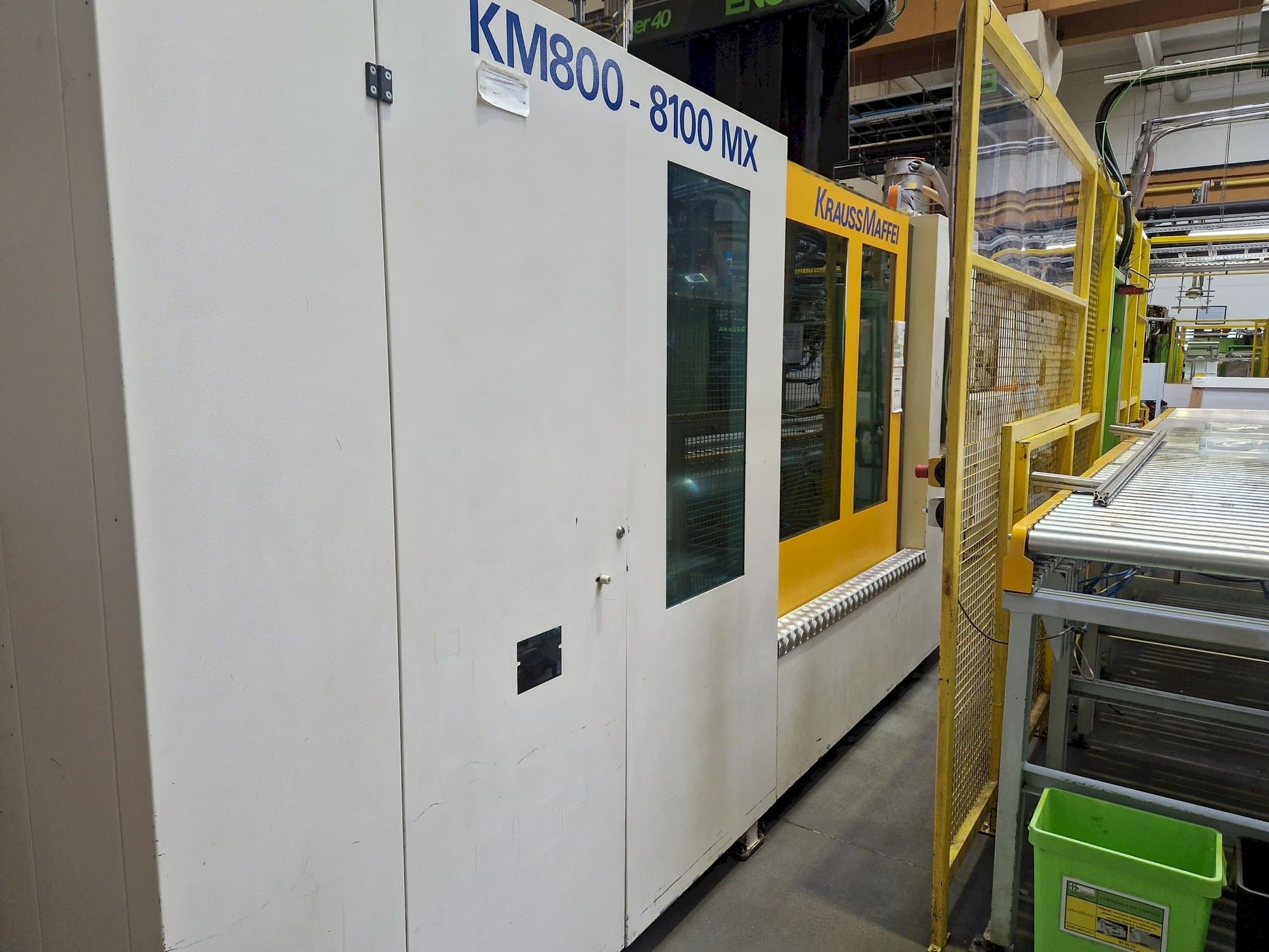 Left side view of Krauss Maffei 800-8100 MX machine