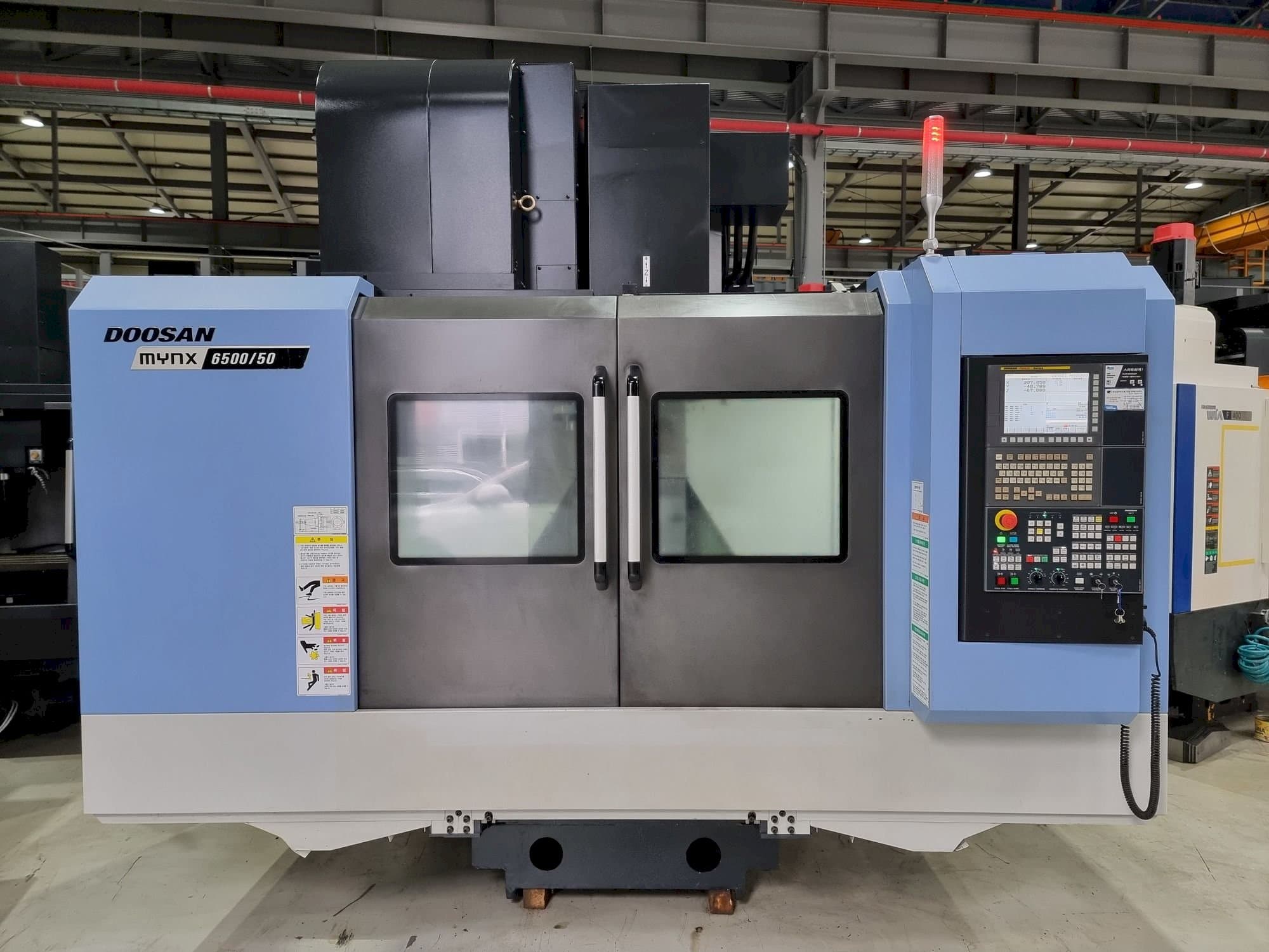 Front view of Doosan MYNX 6500/50  machine
