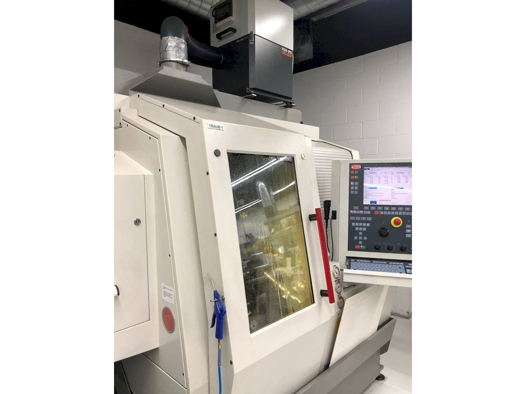 Front view of TRAUB TNL 18 machine