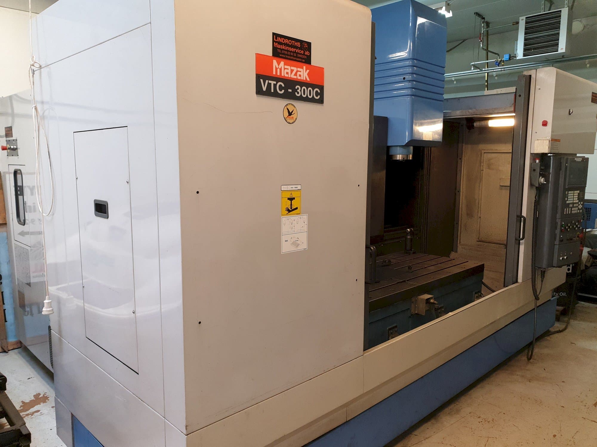 Left side view of Mazak VTC-300C machine