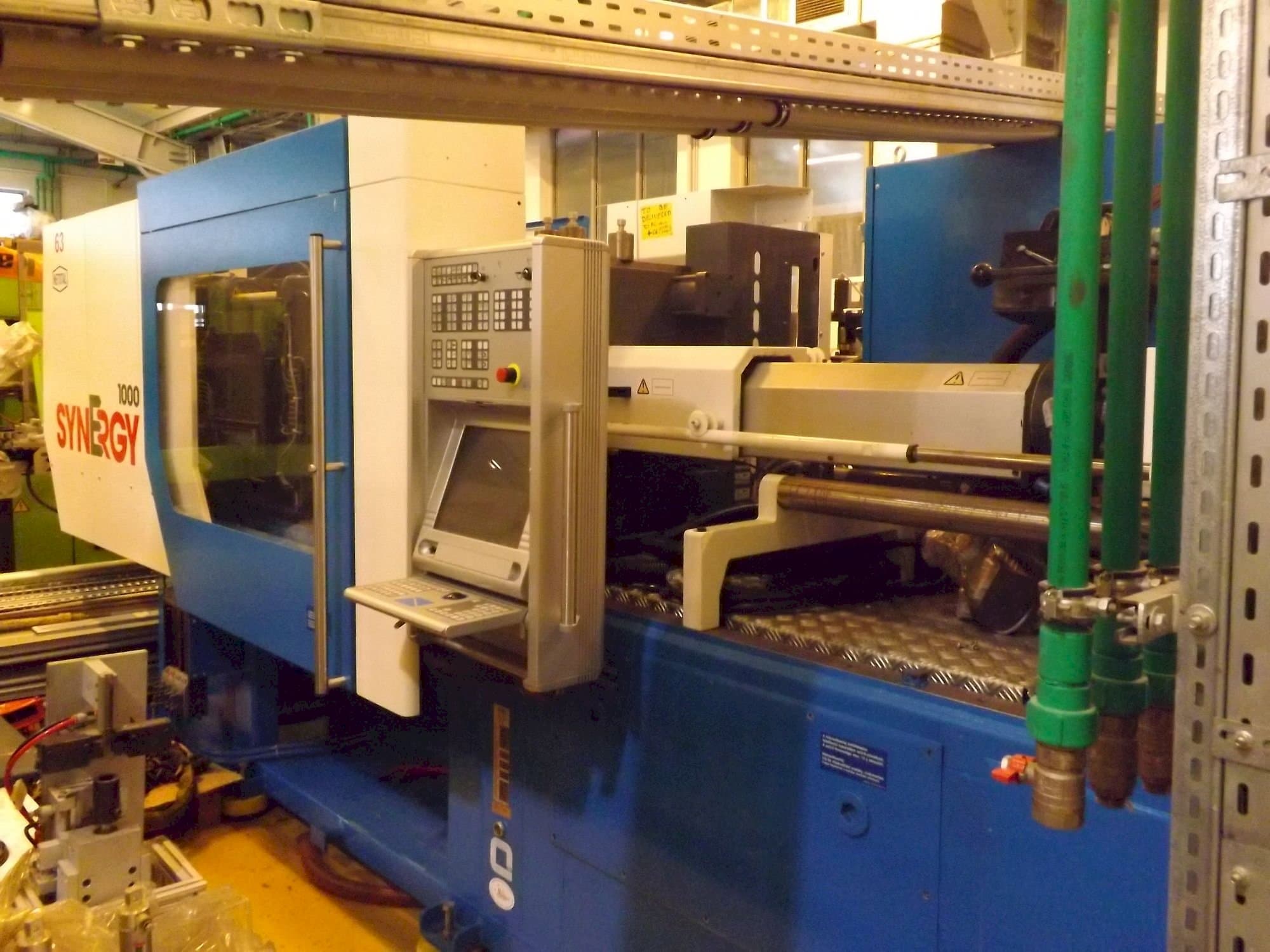 Front view of Netstal Synergy 1000 230-110  machine