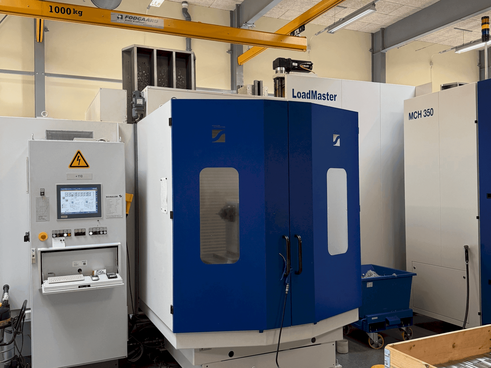 Front view of HELLER MCH 300 + MCH 300 C + 22 pallet system machine