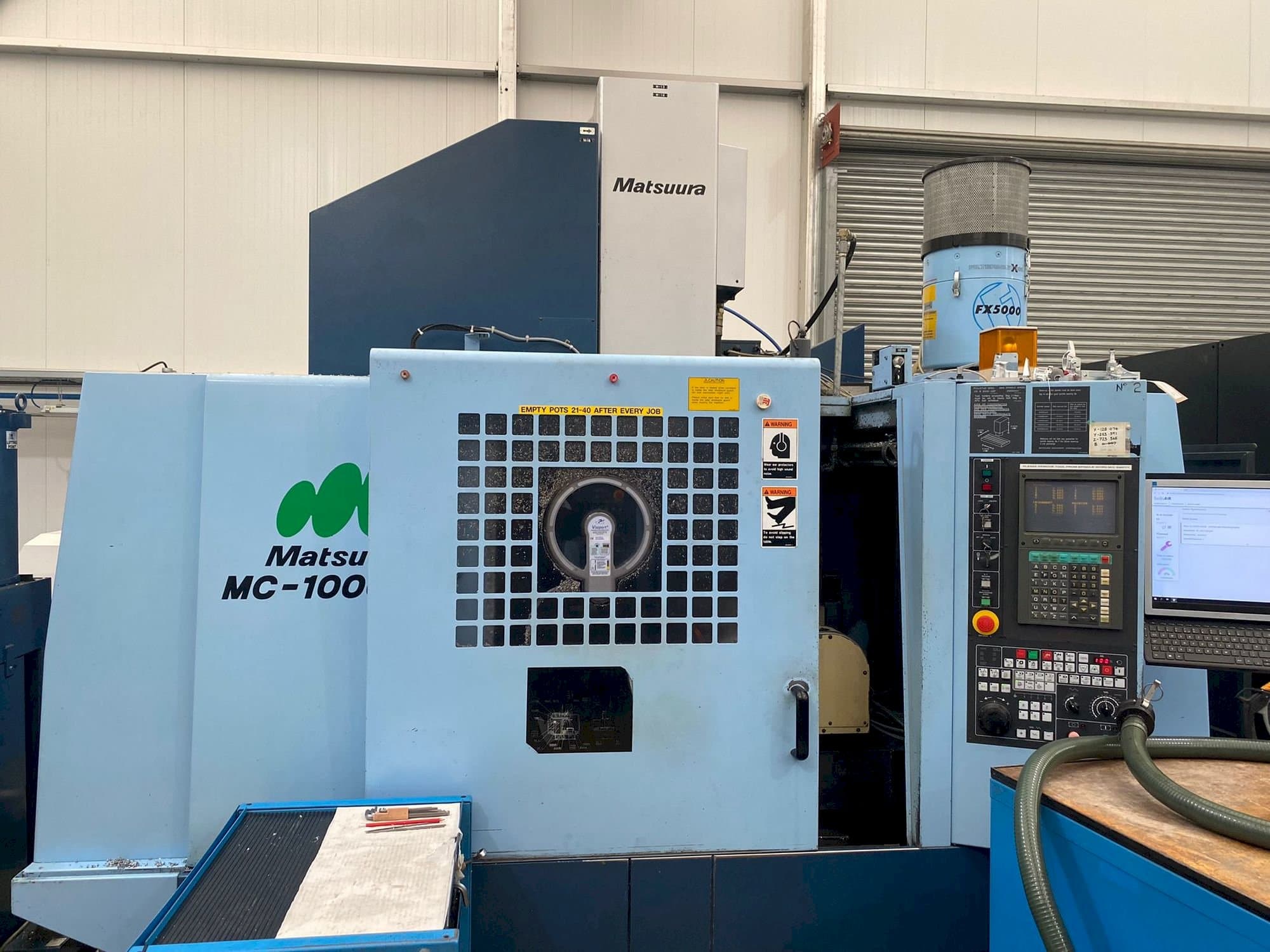 Front view of Matsuura MC-1000 VGX machine
