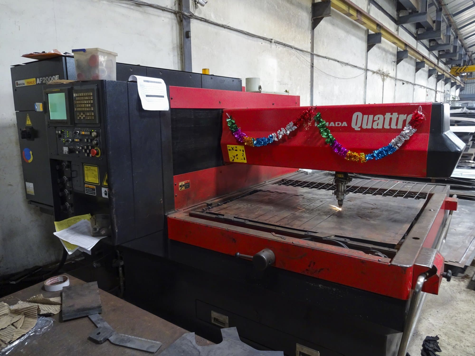 Front view of AMADA Quattro AF2000E machine