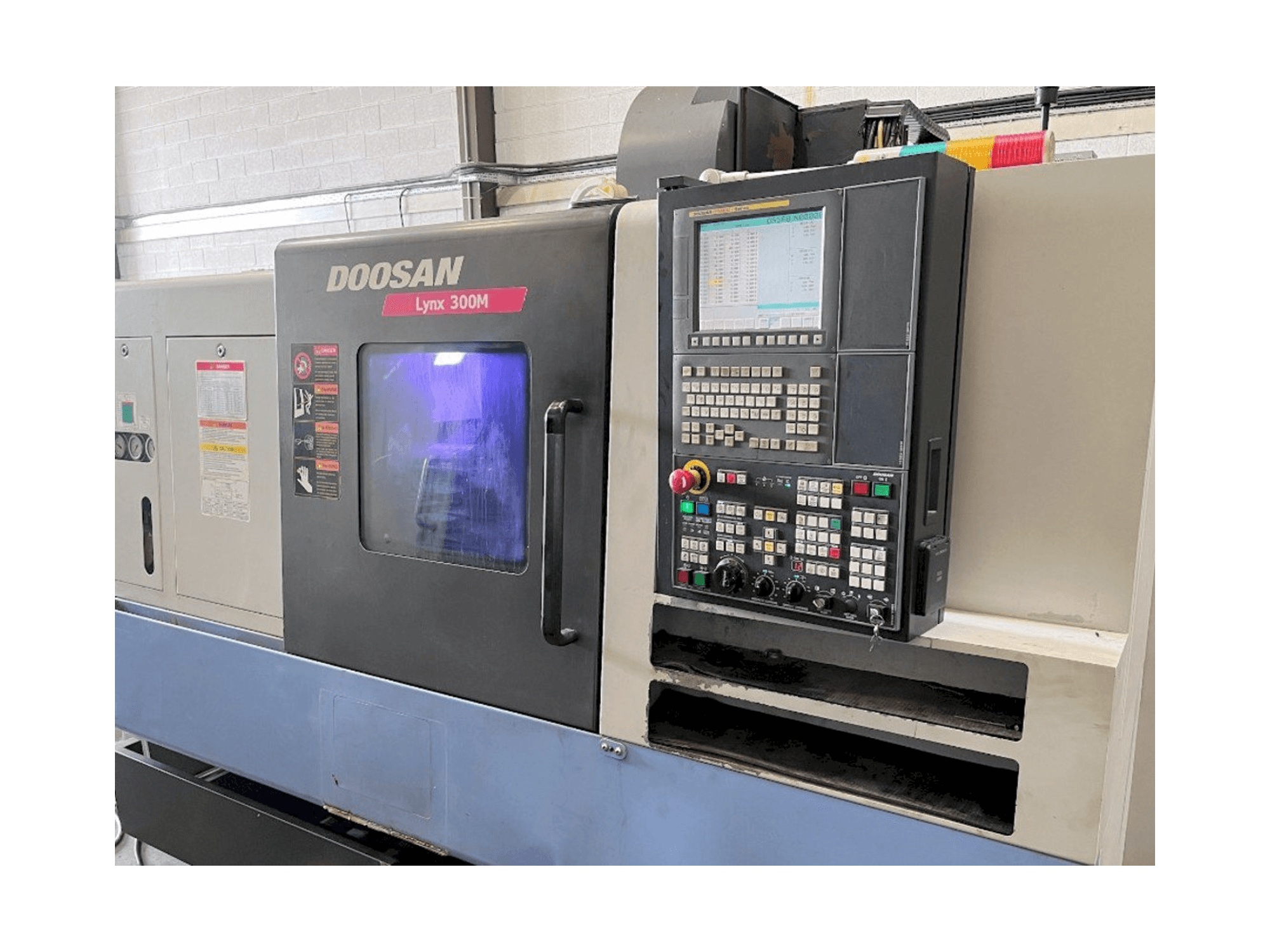 Front view of Doosan Lynx 300M machine