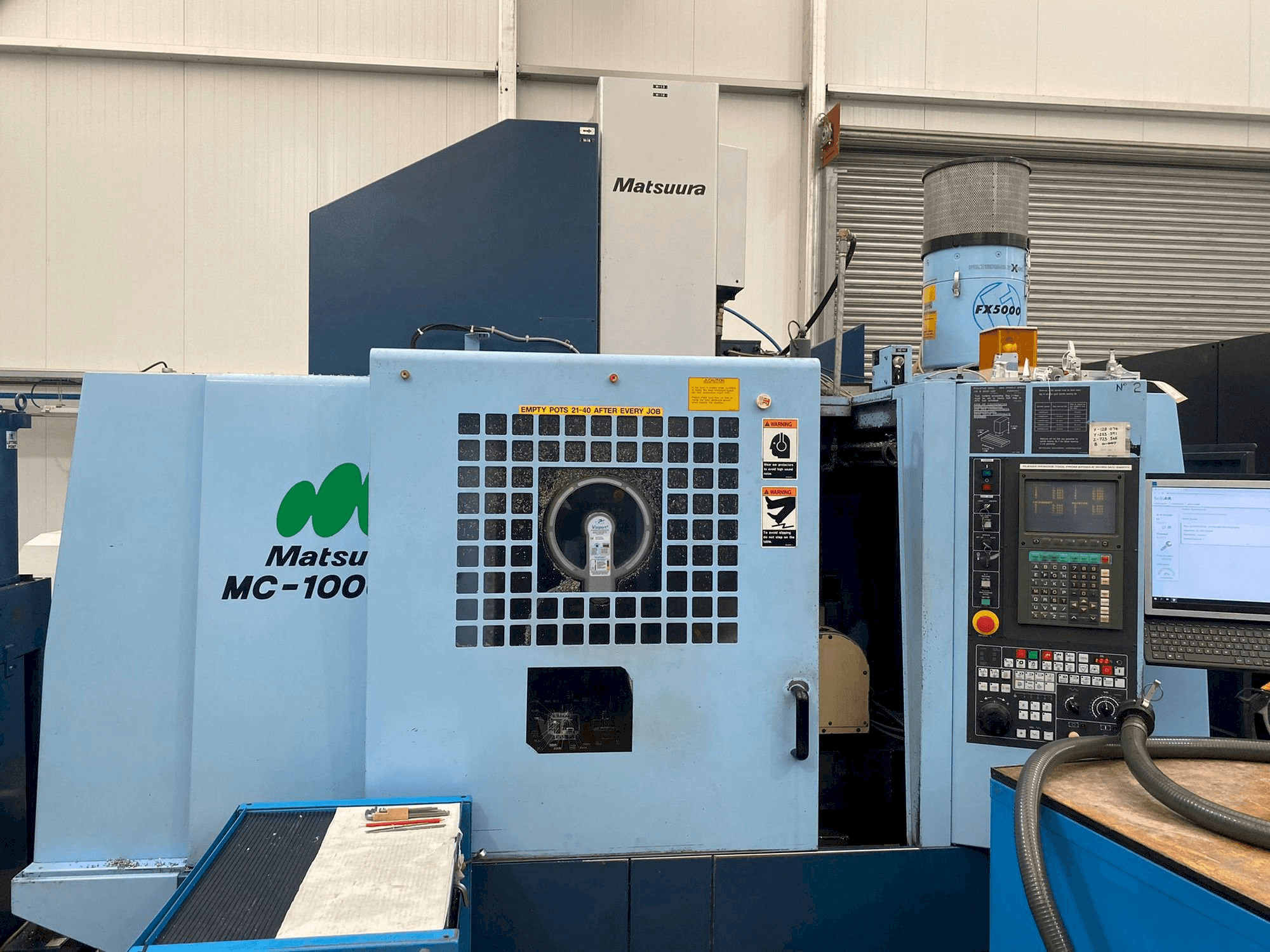 Front view of Matsuura MC-1000 VGX machine