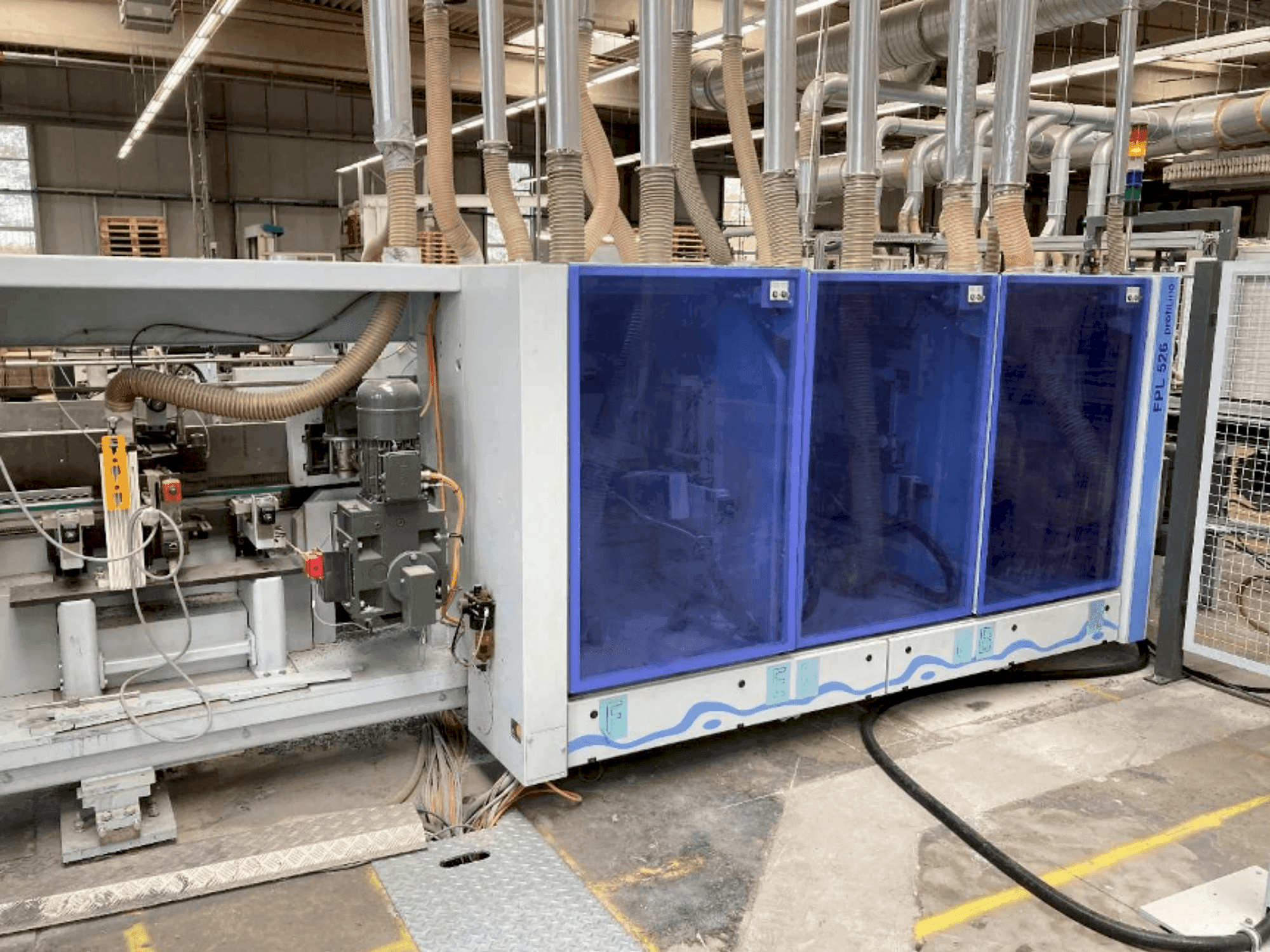 Front view of HOMAG PROFI FPL 525/6/04/PW/V LVT Profiling System machine