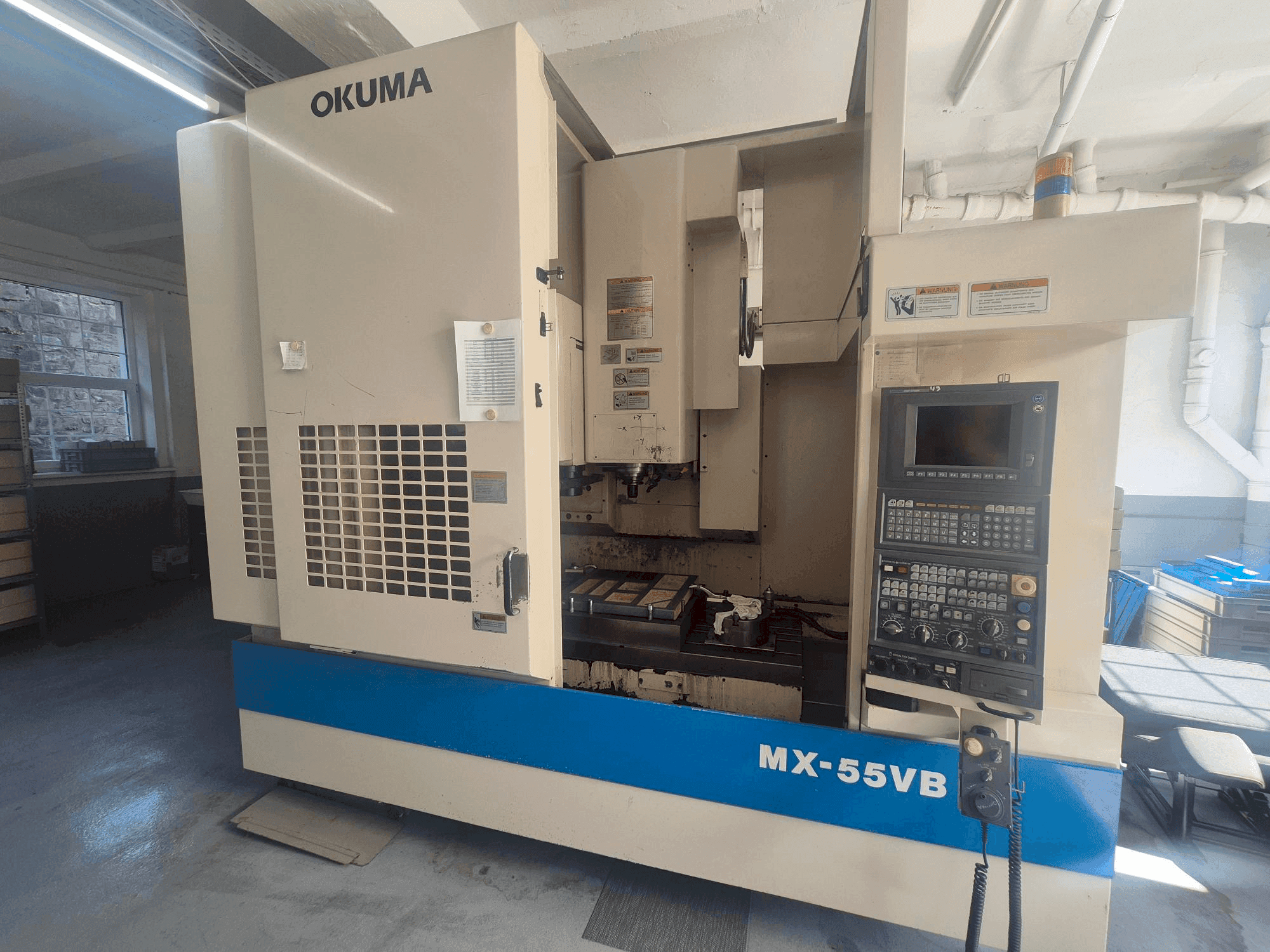 Front view of Okuma MX-55VB machine