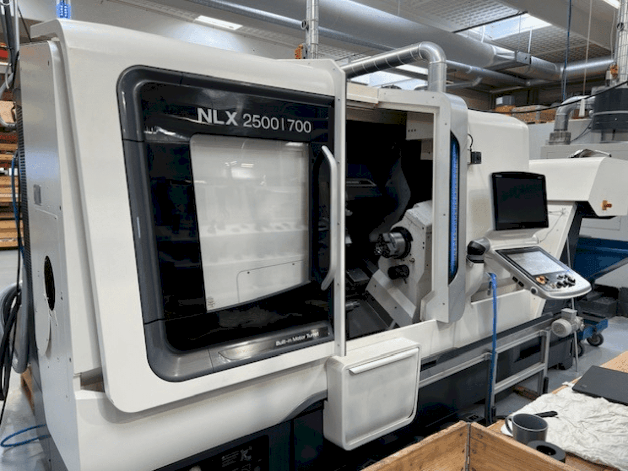 Front view of DMG MORI NLX2500SY/700 machine