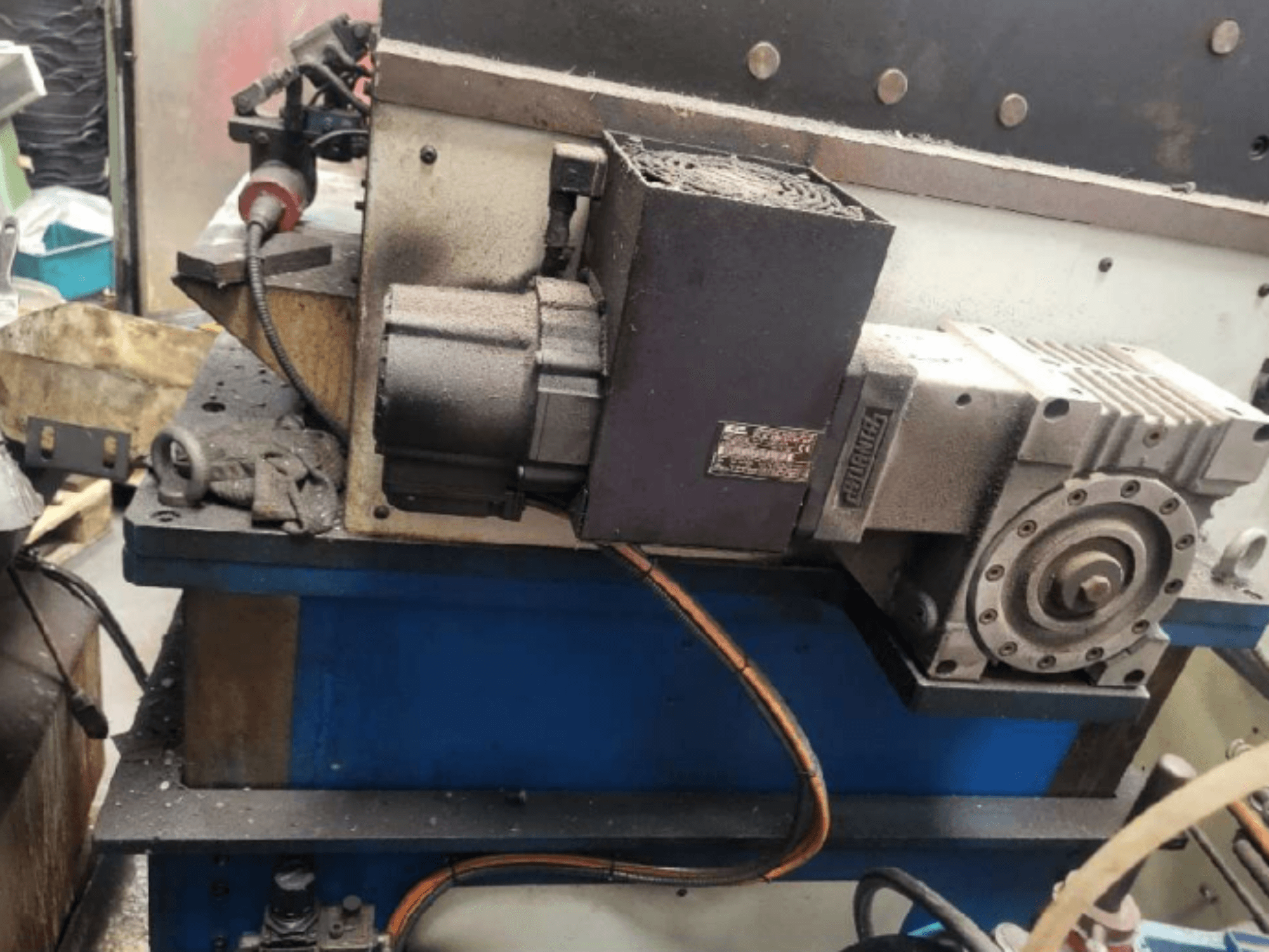 Mechanical stamping press PRESSIX 160 CNR 6, side view showing motor and connections on a blue platform.