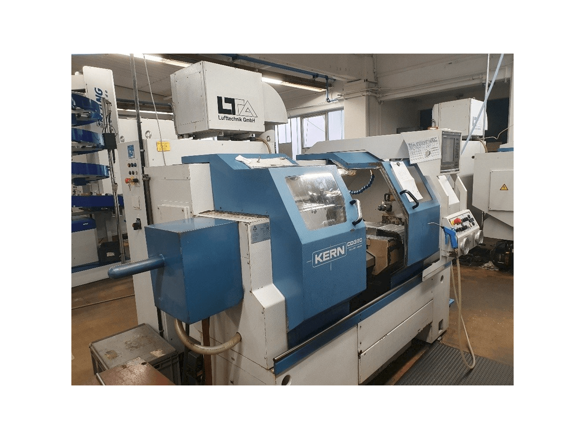 Left side view of DTM CD 320 machine