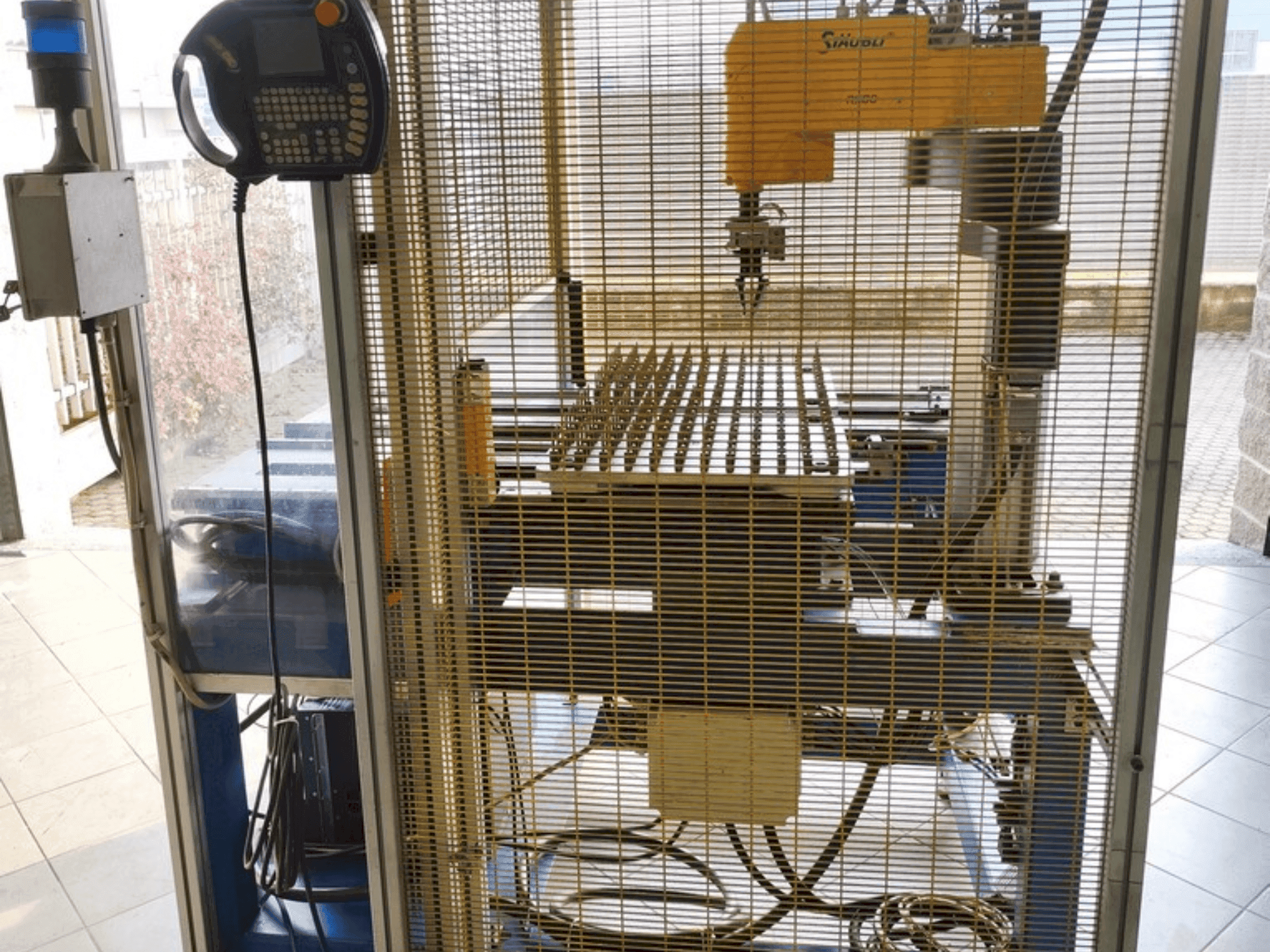 Front view of STAUBLI RS80 machine