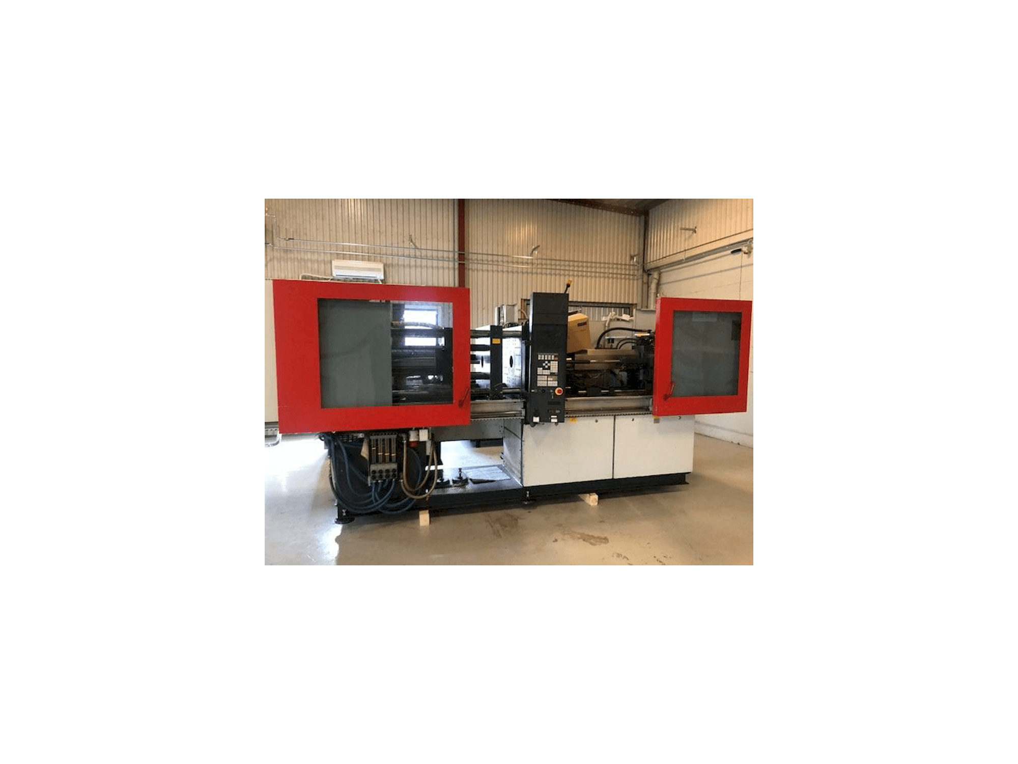 Front view of FERROMATIK MILACRON K110 machine