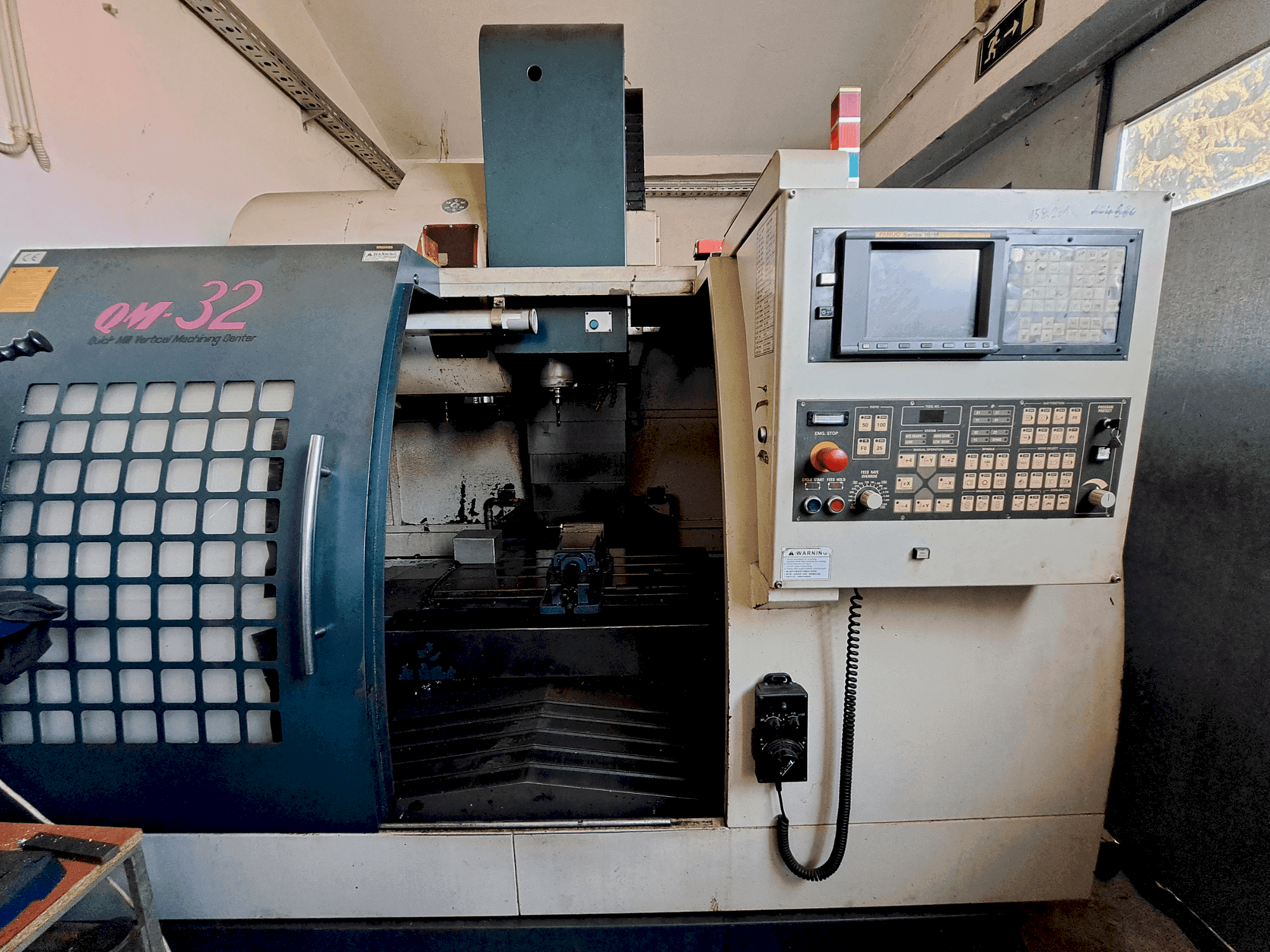 Front view of Feeler QM-32 machine