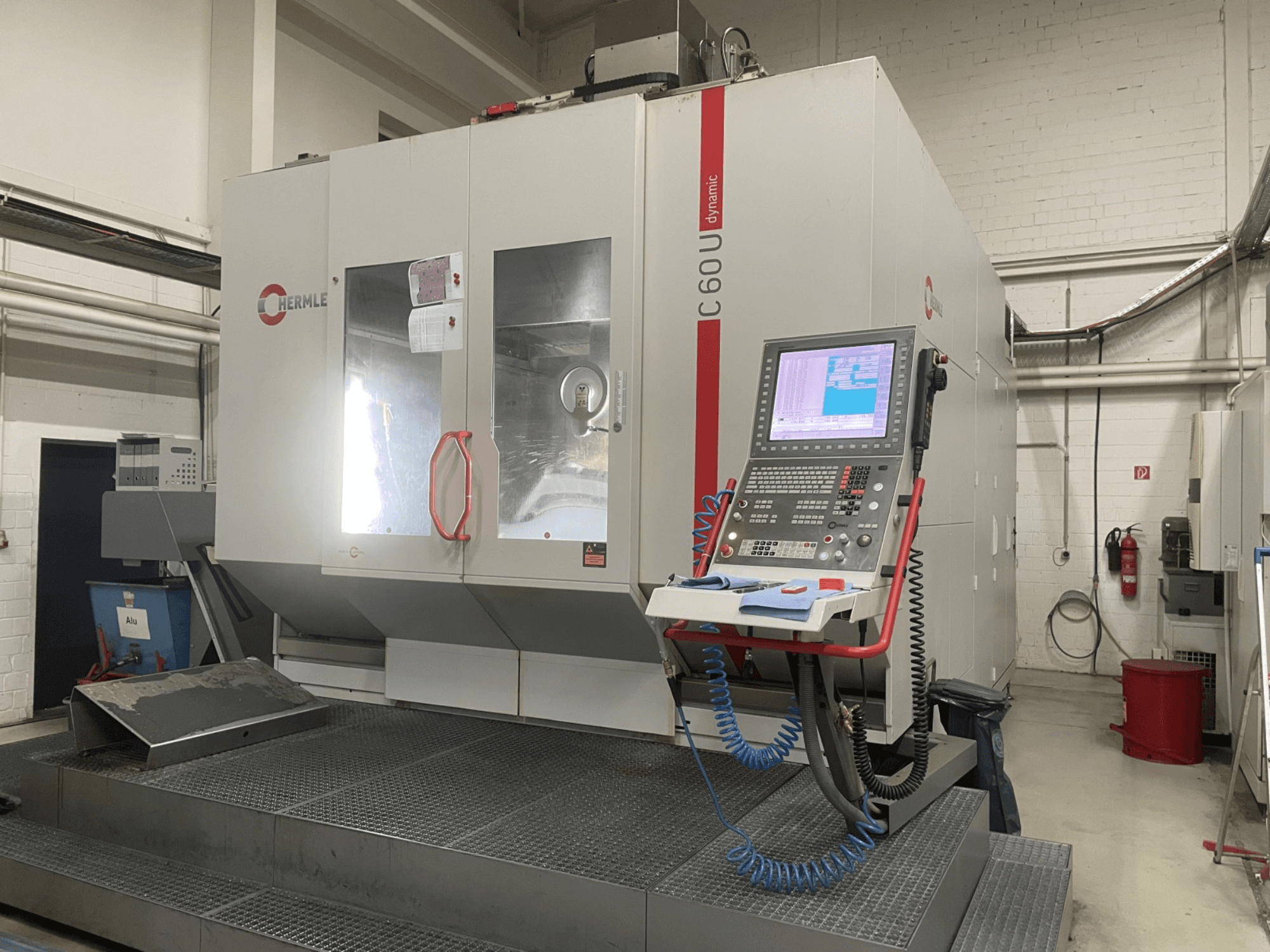 HERMLE C60U Dynamic universal machining centre in front view, showcasing control panel and large machining area.