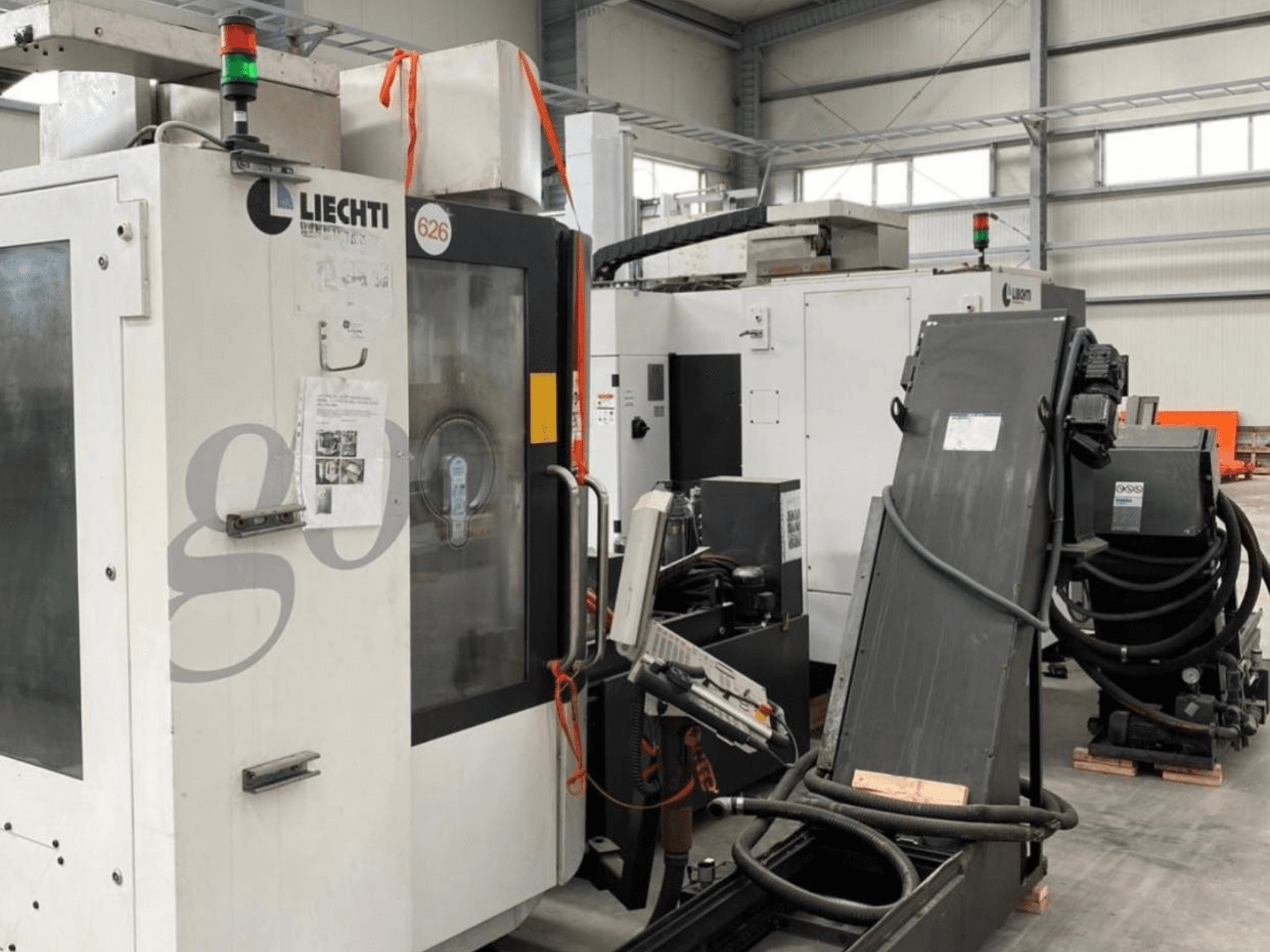 Liechti go-Mill 350 vertical machining center, front view, features control panel and angled part holder.