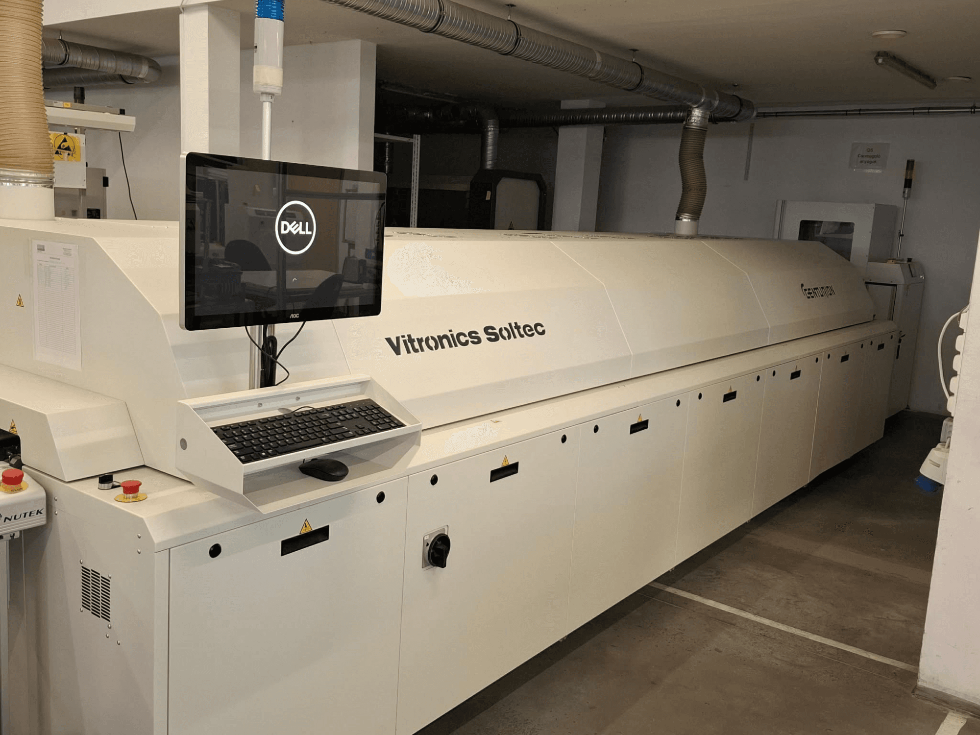 Front view of CENTURION CT930 automation equipment, featuring a Dell monitor with keyboard and control buttons.