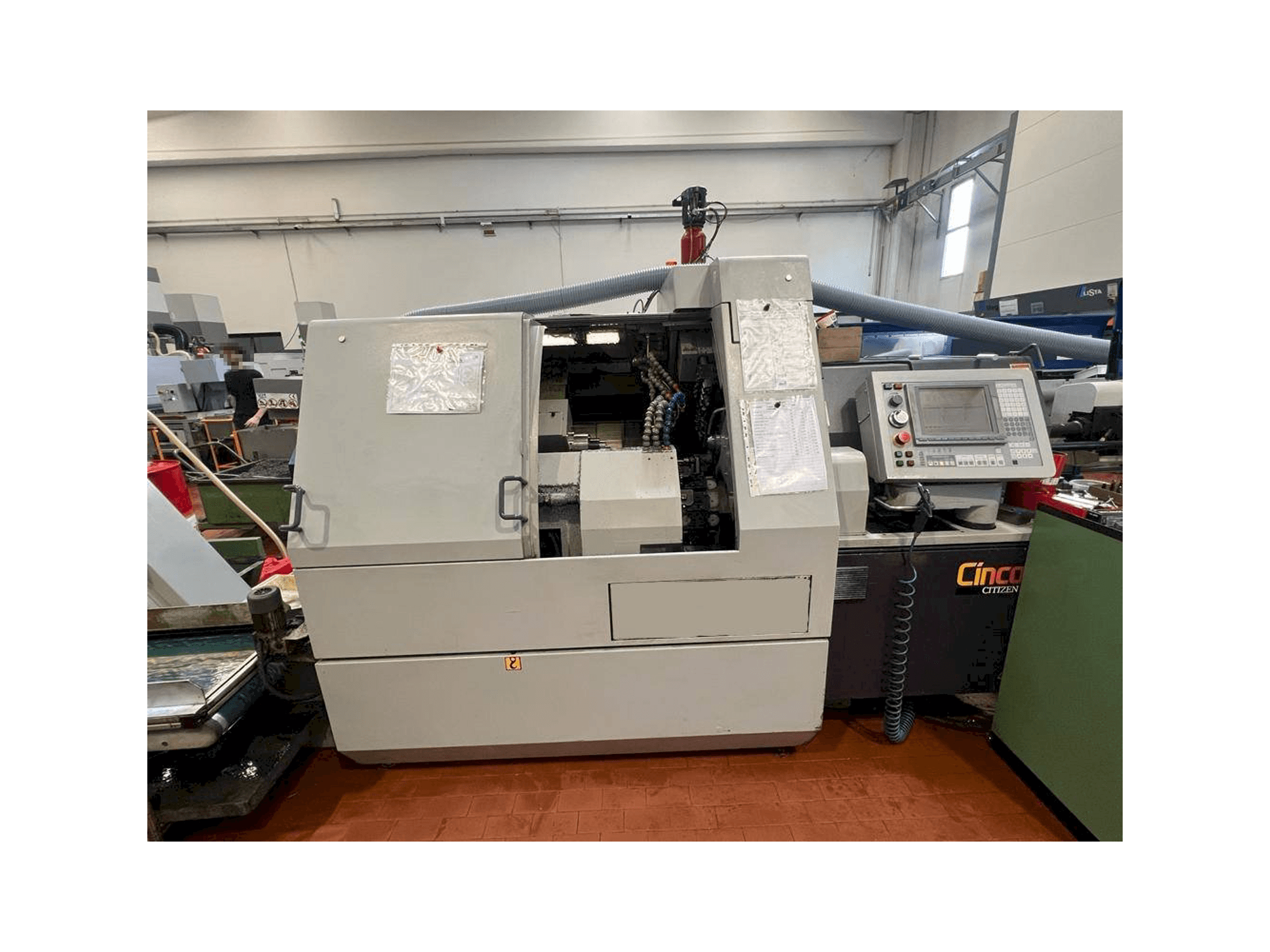 Front view of Citizen M32 machine