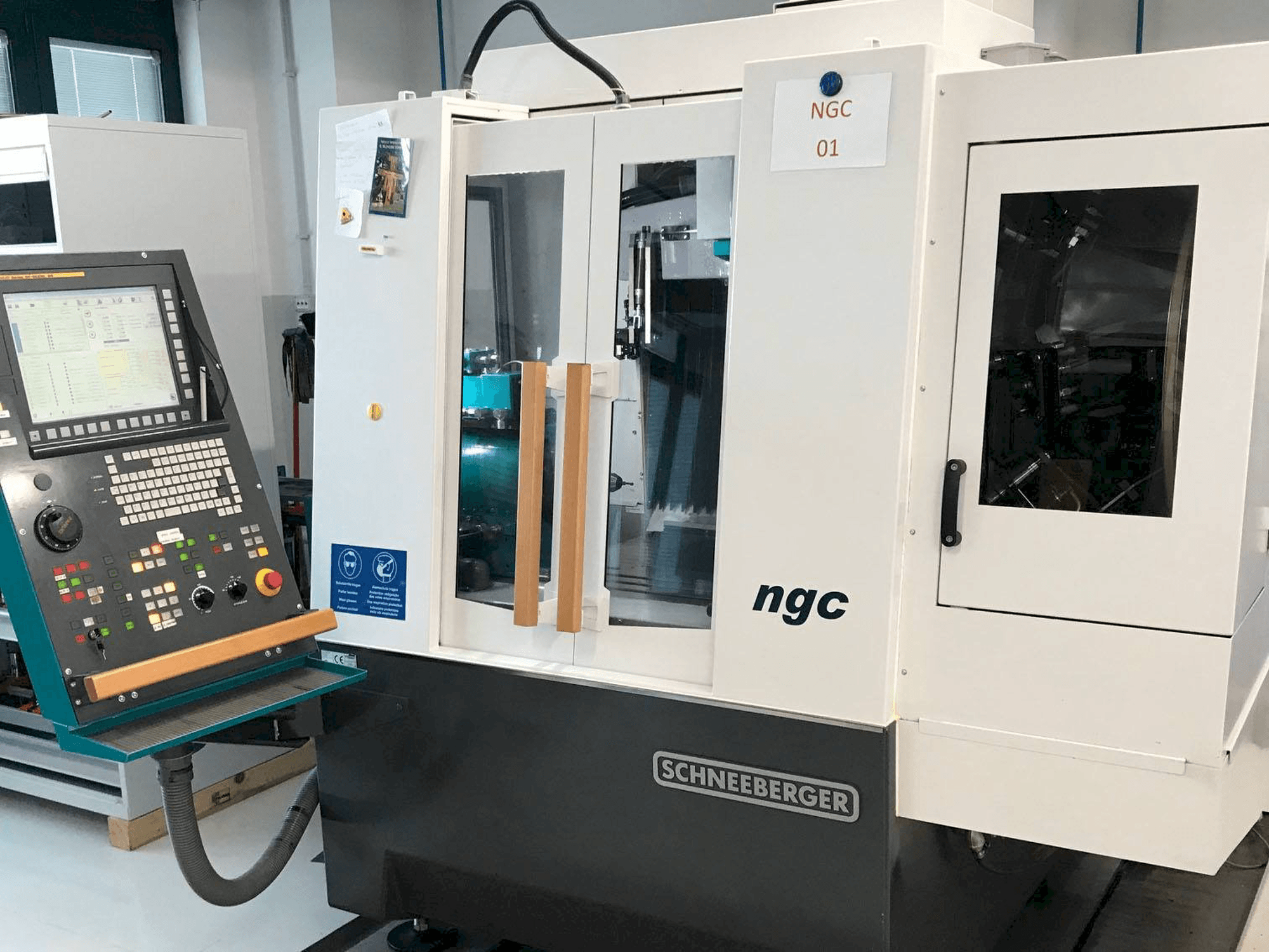 Front view of Schneeberger NGC machine