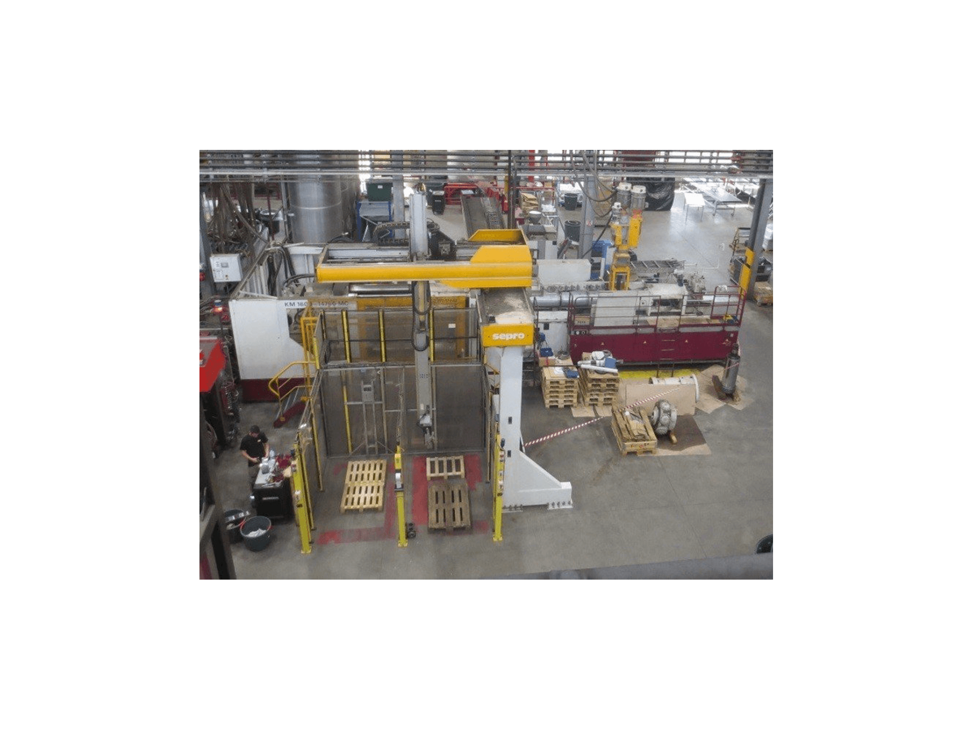 Front view of Krauss Maffei KM 1600 MC SP 14700 machine