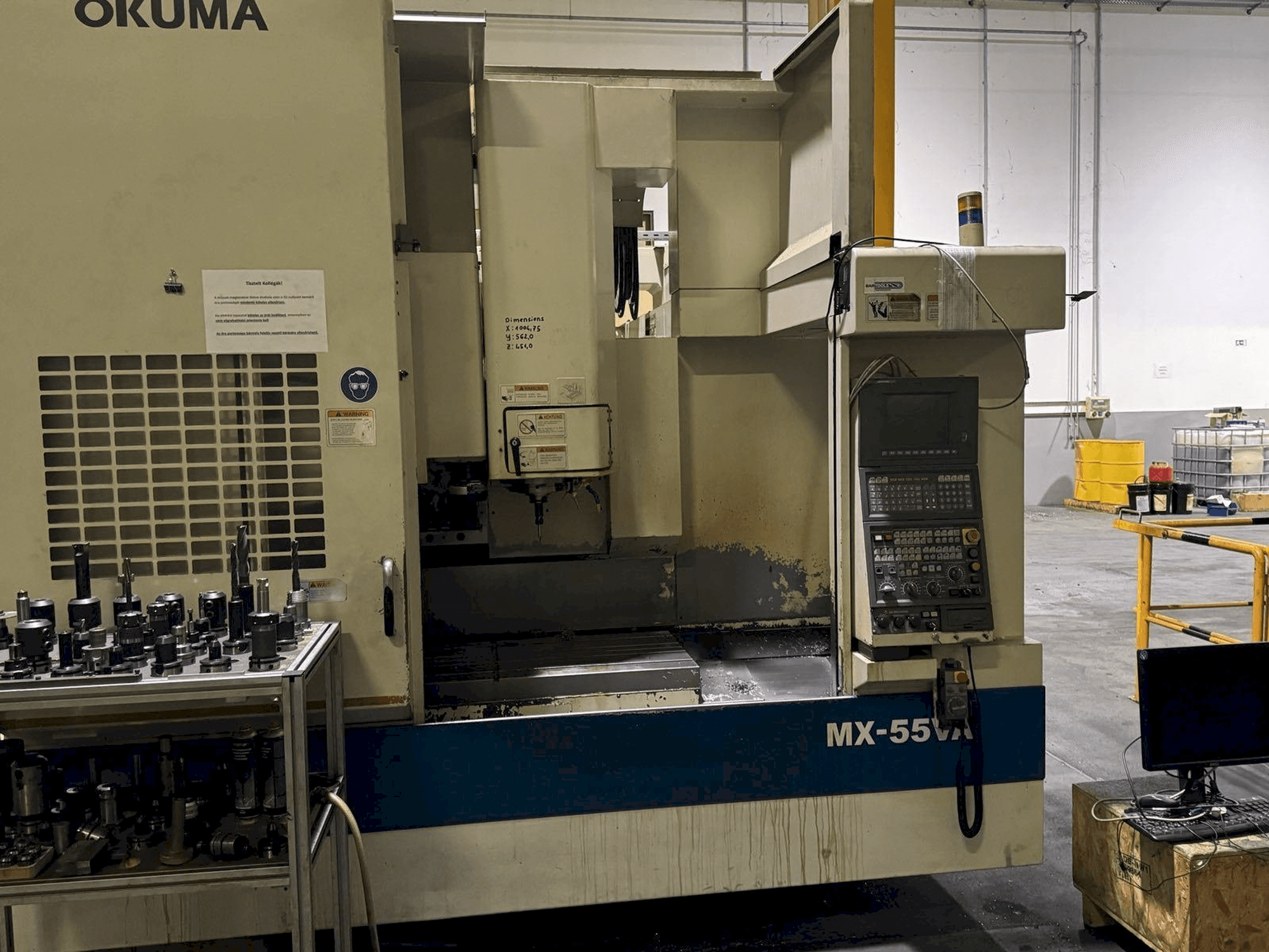 Front view of Okuma MX55-VA machine