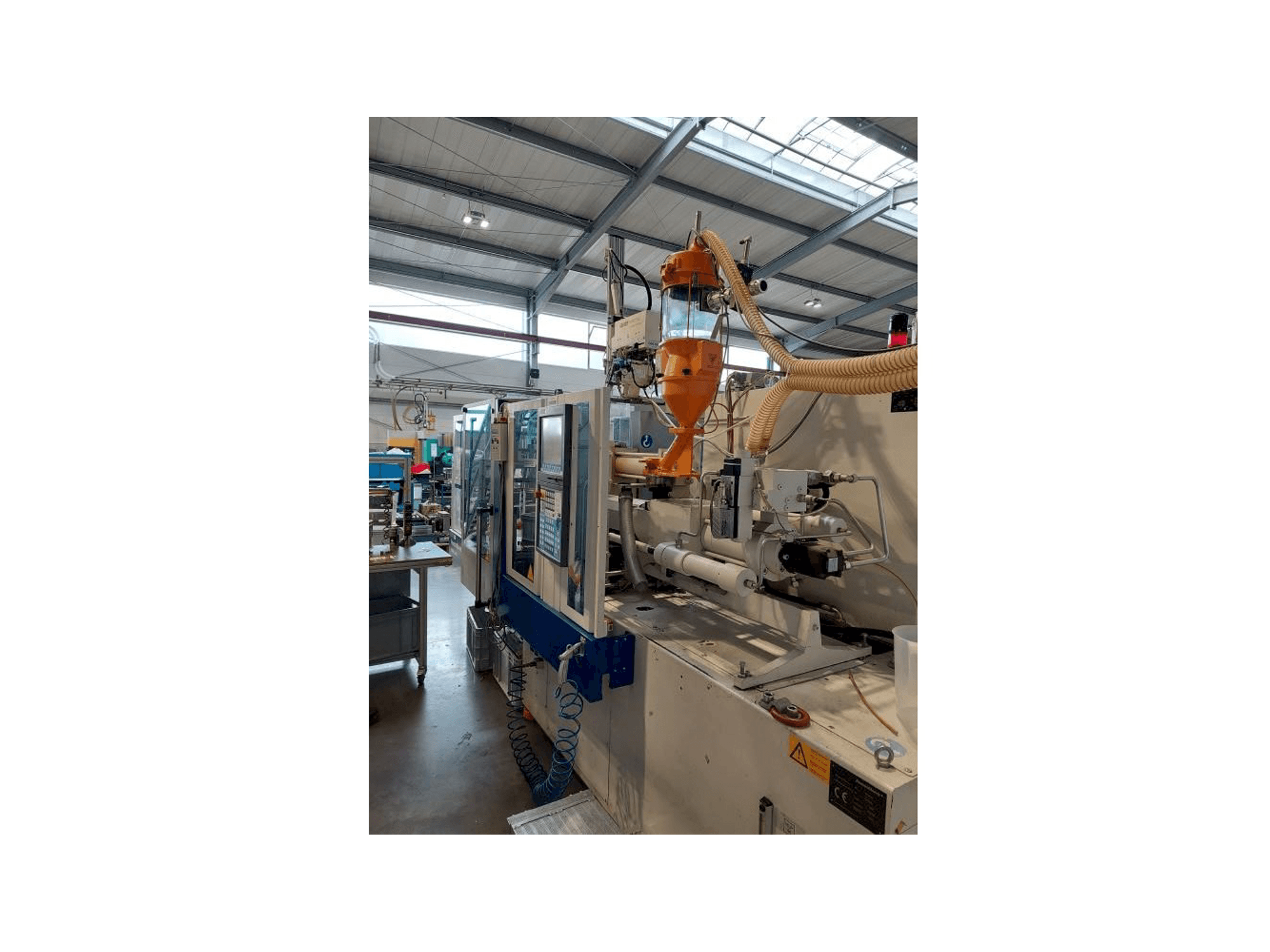 Front view of Krauss Maffei 80-180 CX machine