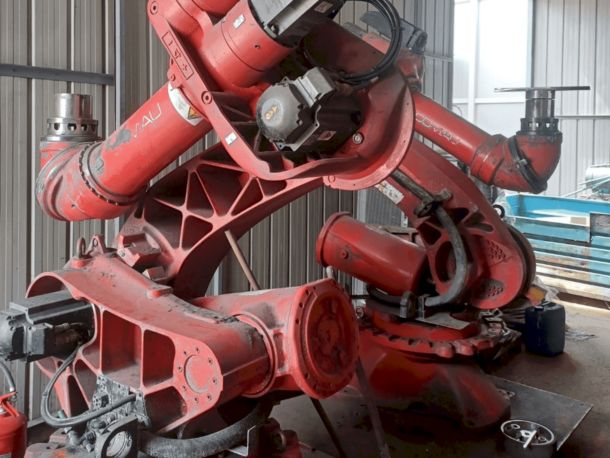 Front view of COMAU C4G RCC3 machine