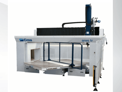 CMS Ares TR CNC machine, side view, features a large work table and enclosed design for precision cutting applications.