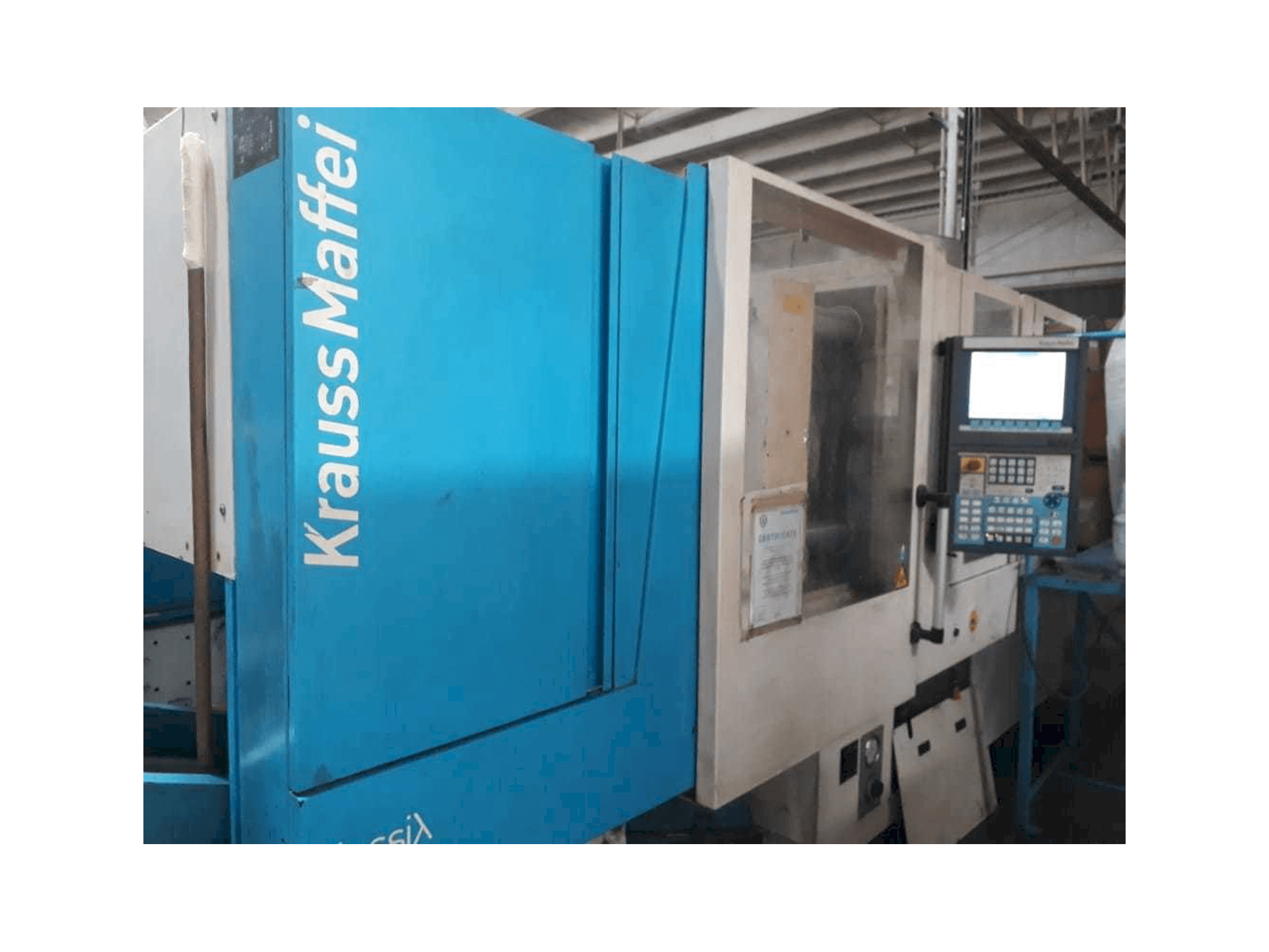 Front view of Krauss Maffei 160/750 CX machine