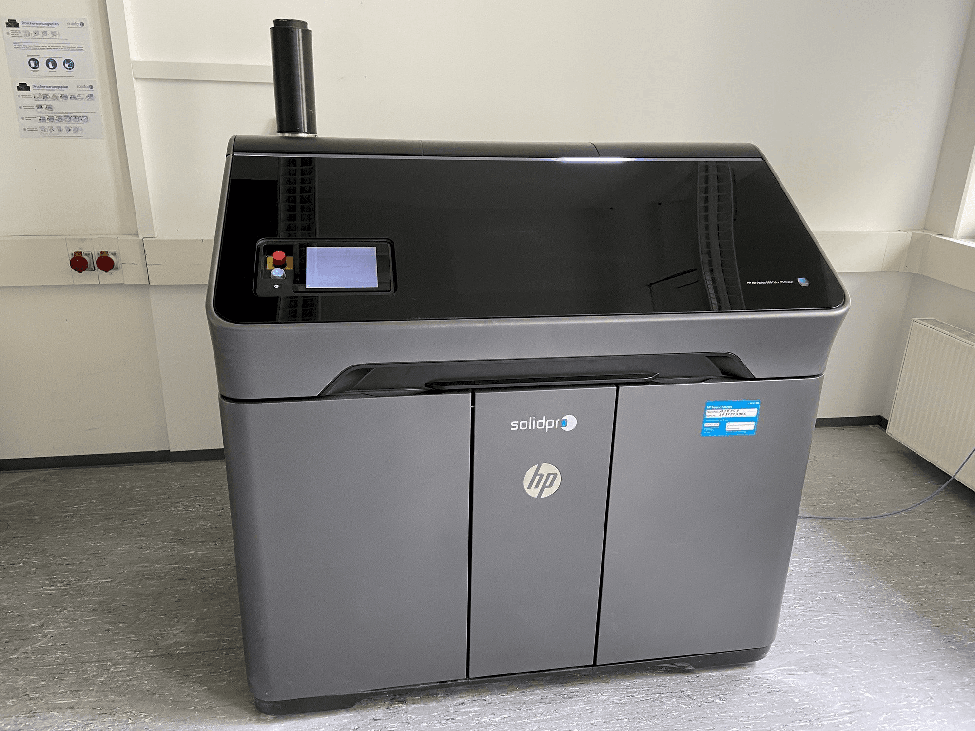 Front view of HP Jet Fusion 580 Color 3D printer machine