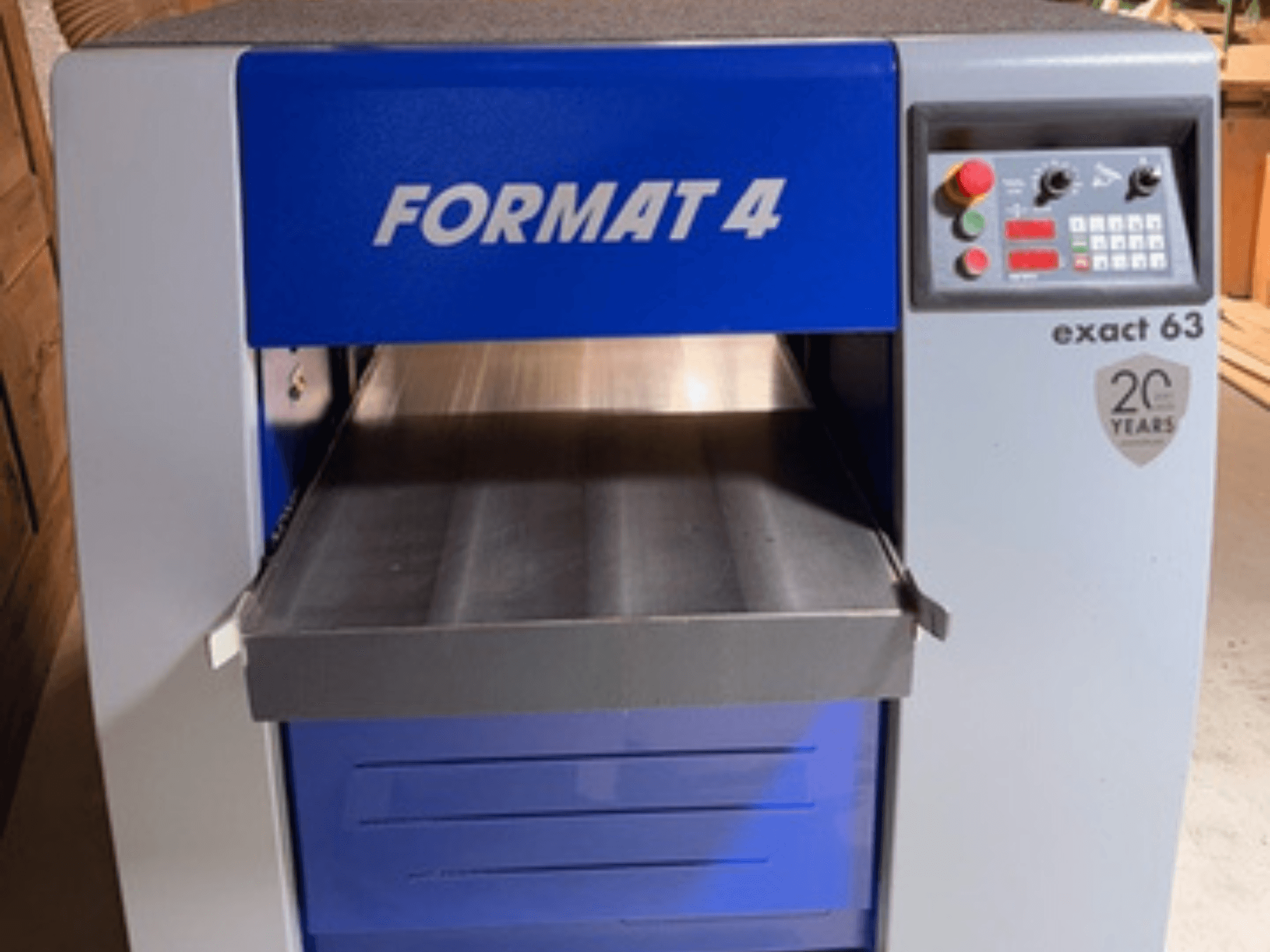 FORMAT 4 Exact 63 wood planer, front view, featuring a metal feed table and a control panel with buttons and displays.
