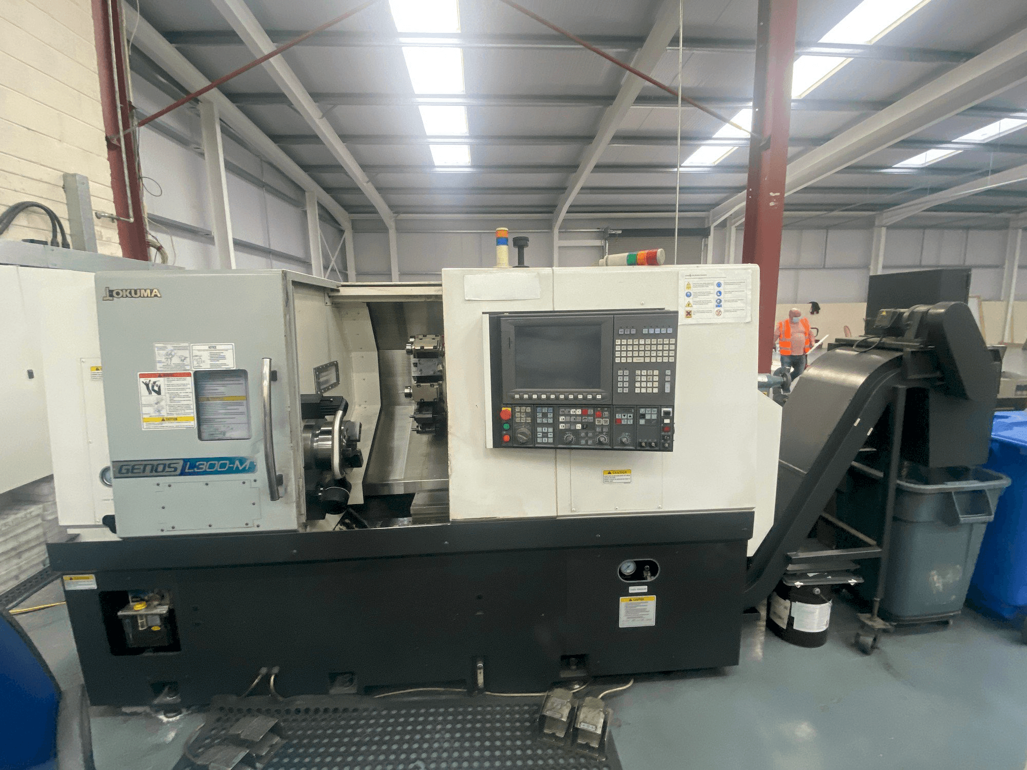 Front view of Okuma Genos L300MW machine