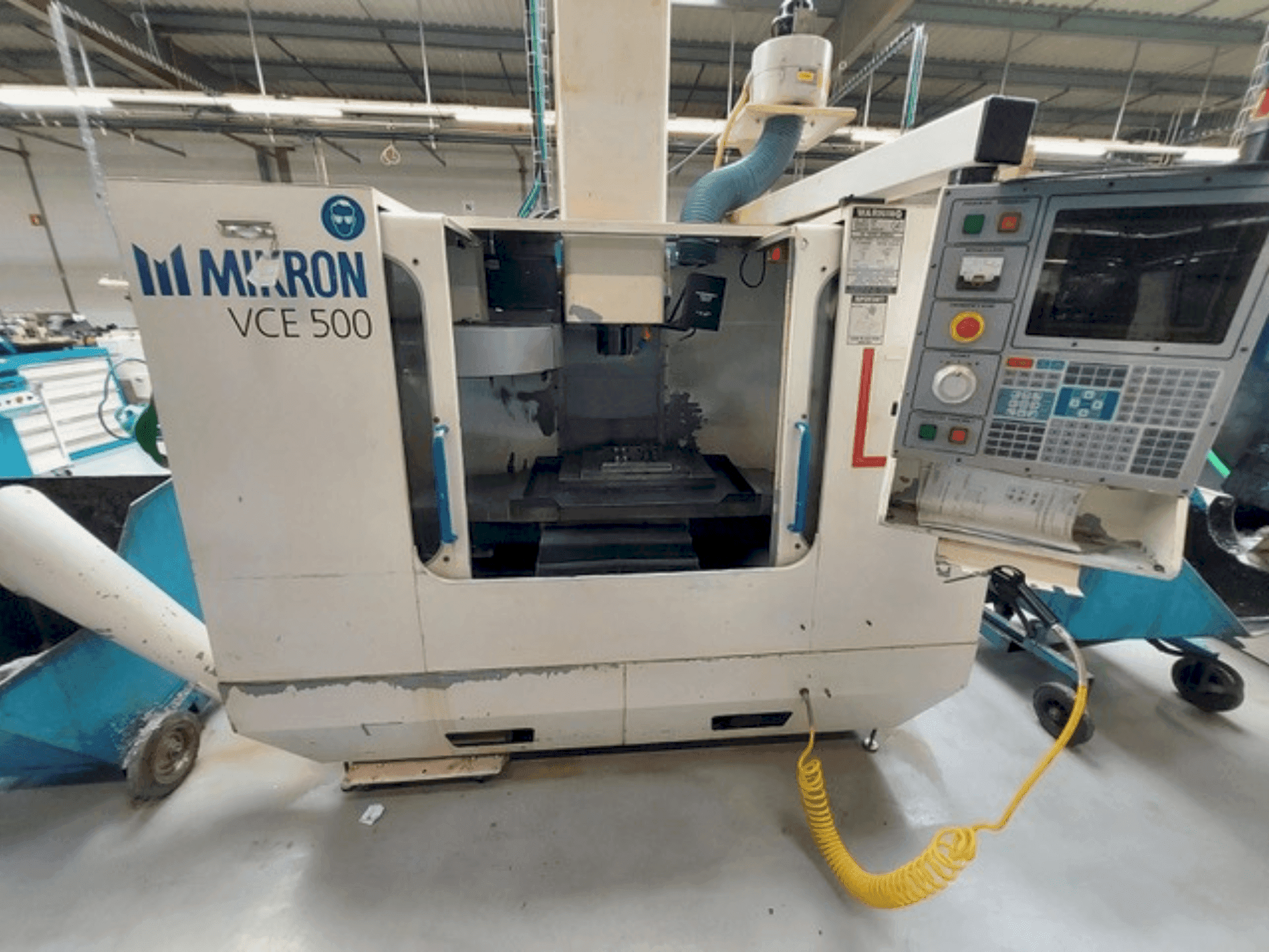 Front view of HAAS MIKRON VCE 500 machine