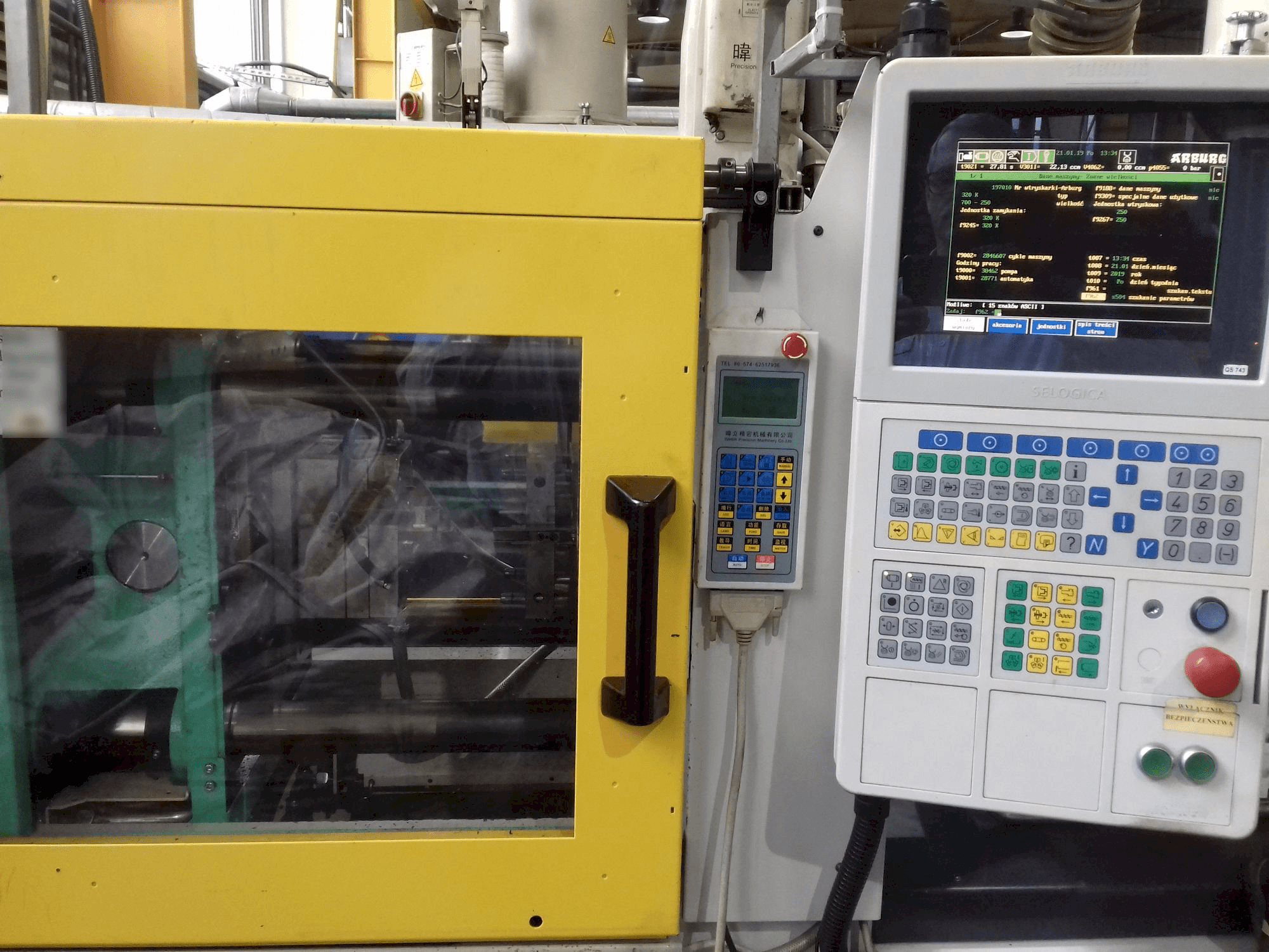 Front view of Arburg ALLROUNDER 320 K 700-250 machine