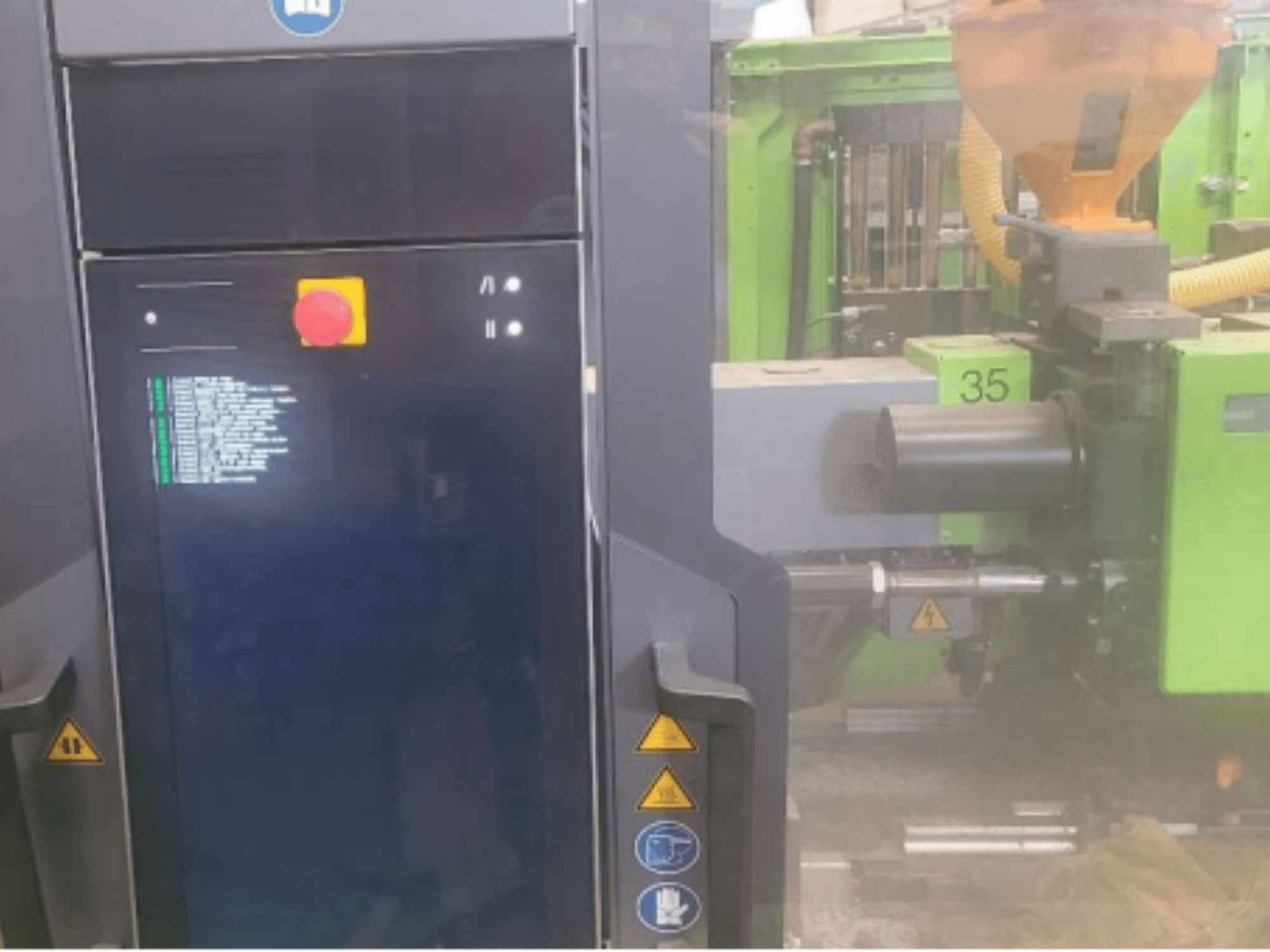 Engel Victory 320/80 spex hydraulic injection moulding machine, front view showing control panel and green injection unit.