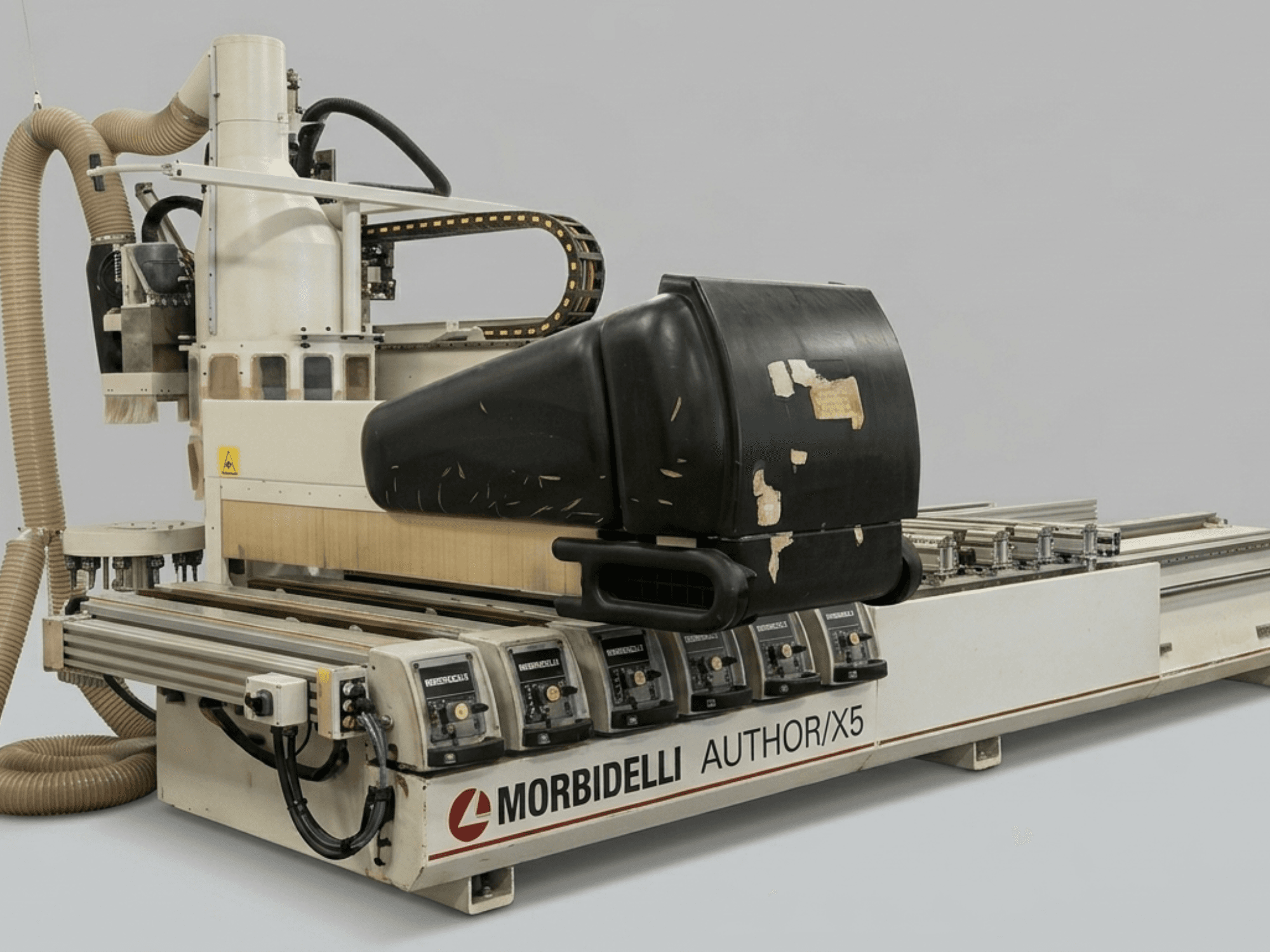 MORBIDELLI Author X5 CNC wood machining center in side view, showcasing the router head and linear components.